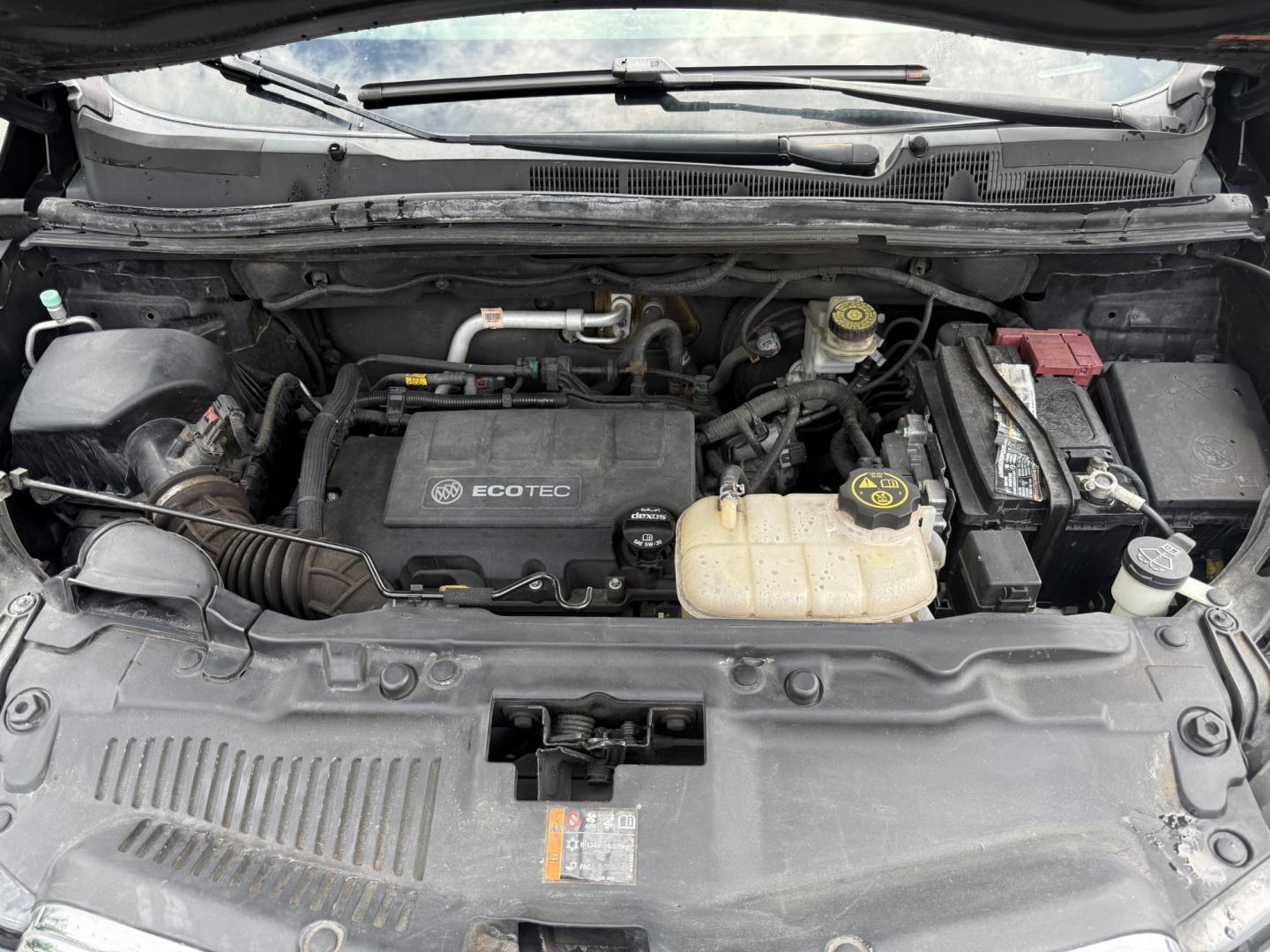 2016 Black /Black Buick Encore Base AWD (KL4CJESBXGB) with an 1.4L I4 DOHC 16V TURBO engine, Automatic transmission, located at 547 E. Main St., Orwell, OH, 44076, (440) 437-5893, 41.535435, -80.847855 - 2016 Buick Encore AWD – Compact Luxury with Turbo Efficiency and All-Weather Grip! This sharp 2016 Buick Encore AWD is a premium compact crossover that delivers refinement, comfort, and strong fuel economy in an easy-to-park size. Powered by a peppy 1.4L Turbocharged EcoTec I4 engine paired with- Photo#5