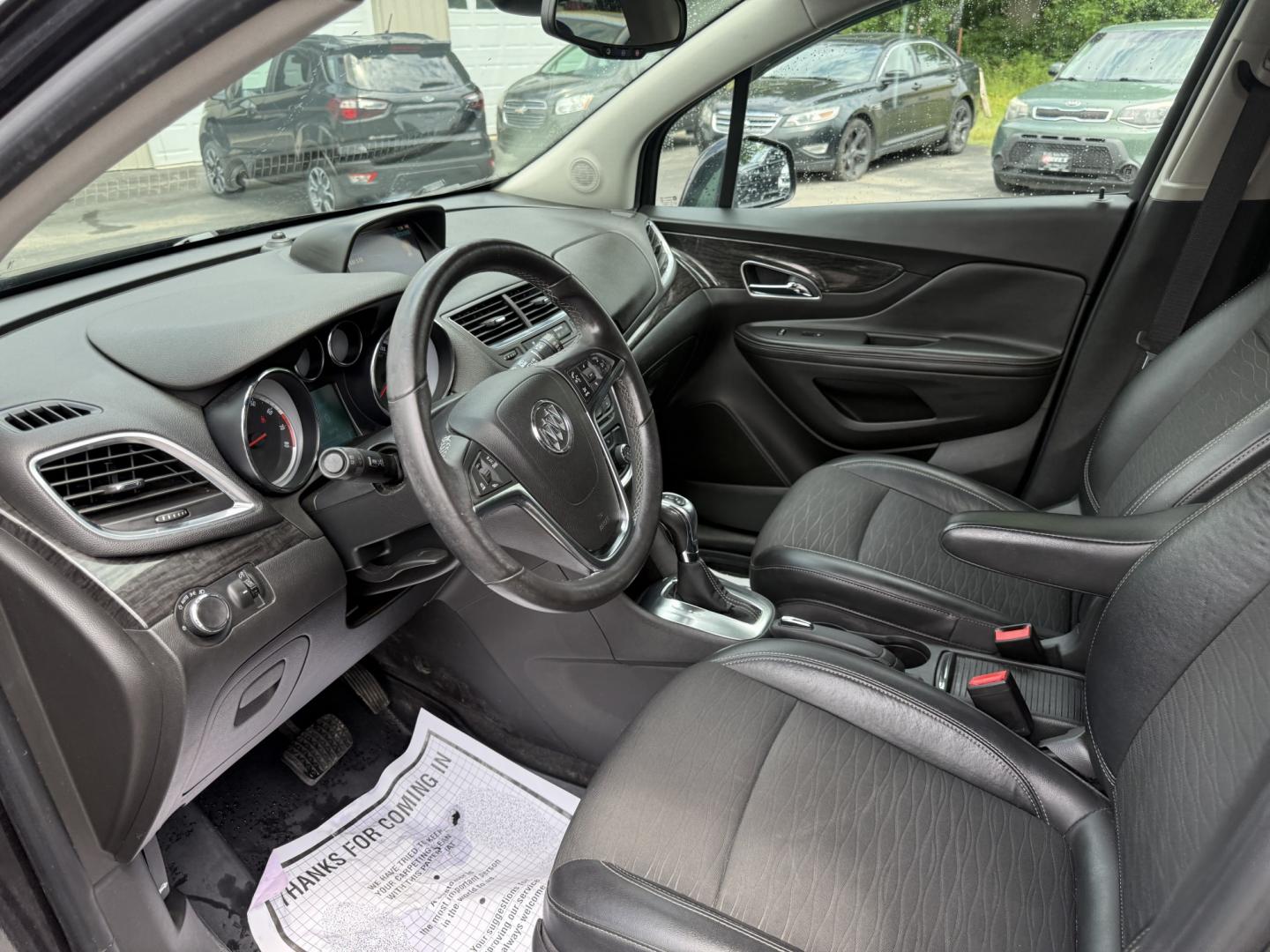 2016 Black /Black Buick Encore Base AWD (KL4CJESBXGB) with an 1.4L I4 DOHC 16V TURBO engine, Automatic transmission, located at 547 E. Main St., Orwell, OH, 44076, (440) 437-5893, 41.535435, -80.847855 - 2016 Buick Encore AWD – Compact Luxury with Turbo Efficiency and All-Weather Grip! This sharp 2016 Buick Encore AWD is a premium compact crossover that delivers refinement, comfort, and strong fuel economy in an easy-to-park size. Powered by a peppy 1.4L Turbocharged EcoTec I4 engine paired with- Photo#6