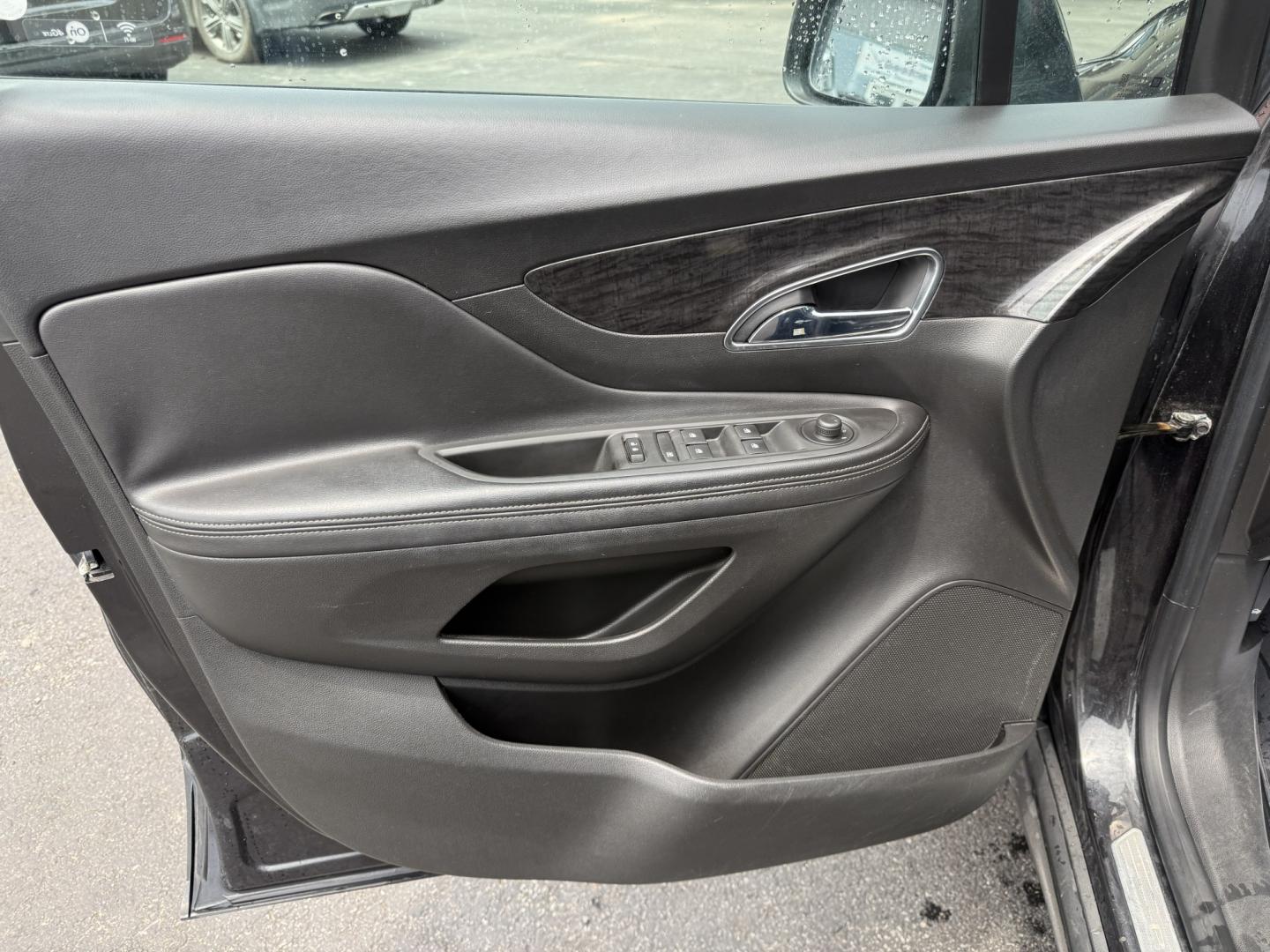 2016 Black /Black Buick Encore Base AWD (KL4CJESBXGB) with an 1.4L I4 DOHC 16V TURBO engine, Automatic transmission, located at 547 E. Main St., Orwell, OH, 44076, (440) 437-5893, 41.535435, -80.847855 - 2016 Buick Encore AWD – Compact Luxury with Turbo Efficiency and All-Weather Grip! This sharp 2016 Buick Encore AWD is a premium compact crossover that delivers refinement, comfort, and strong fuel economy in an easy-to-park size. Powered by a peppy 1.4L Turbocharged EcoTec I4 engine paired with- Photo#7