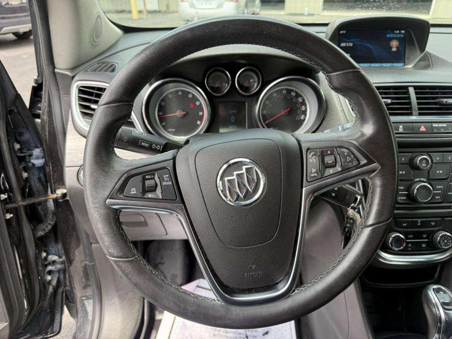 2016 Black /Black Buick Encore Base AWD (KL4CJESBXGB) with an 1.4L I4 DOHC 16V TURBO engine, Automatic transmission, located at 547 E. Main St., Orwell, OH, 44076, (440) 437-5893, 41.535435, -80.847855 - 2016 Buick Encore AWD – Compact Luxury with Turbo Efficiency and All-Weather Grip! This sharp 2016 Buick Encore AWD is a premium compact crossover that delivers refinement, comfort, and strong fuel economy in an easy-to-park size. Powered by a peppy 1.4L Turbocharged EcoTec I4 engine paired with- Photo#11