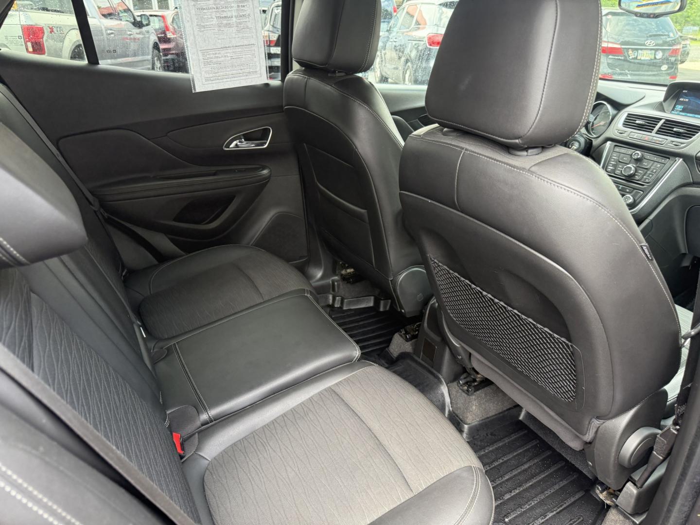 2016 Black /Black Buick Encore Base AWD (KL4CJESBXGB) with an 1.4L I4 DOHC 16V TURBO engine, Automatic transmission, located at 547 E. Main St., Orwell, OH, 44076, (440) 437-5893, 41.535435, -80.847855 - 2016 Buick Encore AWD – Compact Luxury with Turbo Efficiency and All-Weather Grip! This sharp 2016 Buick Encore AWD is a premium compact crossover that delivers refinement, comfort, and strong fuel economy in an easy-to-park size. Powered by a peppy 1.4L Turbocharged EcoTec I4 engine paired with- Photo#31
