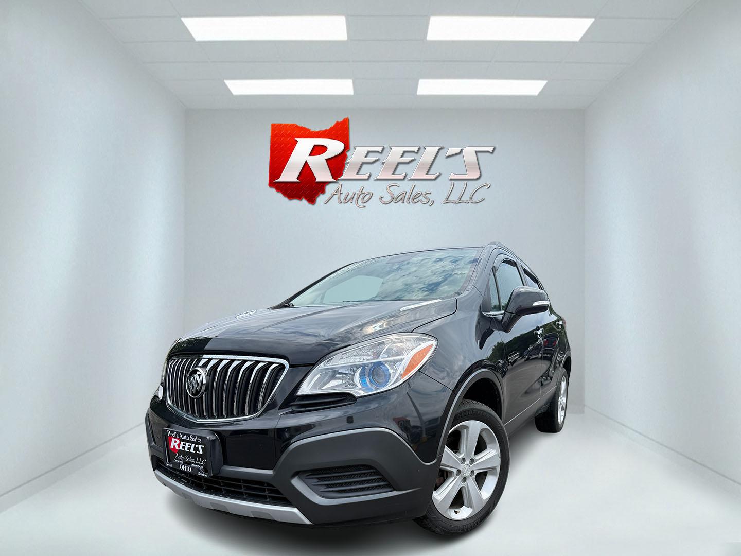 2016 Black /Black Buick Encore Base AWD (KL4CJESBXGB) with an 1.4L I4 DOHC 16V TURBO engine, Automatic transmission, located at 547 E. Main St., Orwell, OH, 44076, (440) 437-5893, 41.535435, -80.847855 - 2016 Buick Encore AWD – Compact Luxury with Turbo Efficiency and All-Weather Grip! This sharp 2016 Buick Encore AWD is a premium compact crossover that delivers refinement, comfort, and strong fuel economy in an easy-to-park size. Powered by a peppy 1.4L Turbocharged EcoTec I4 engine paired with- Photo#0
