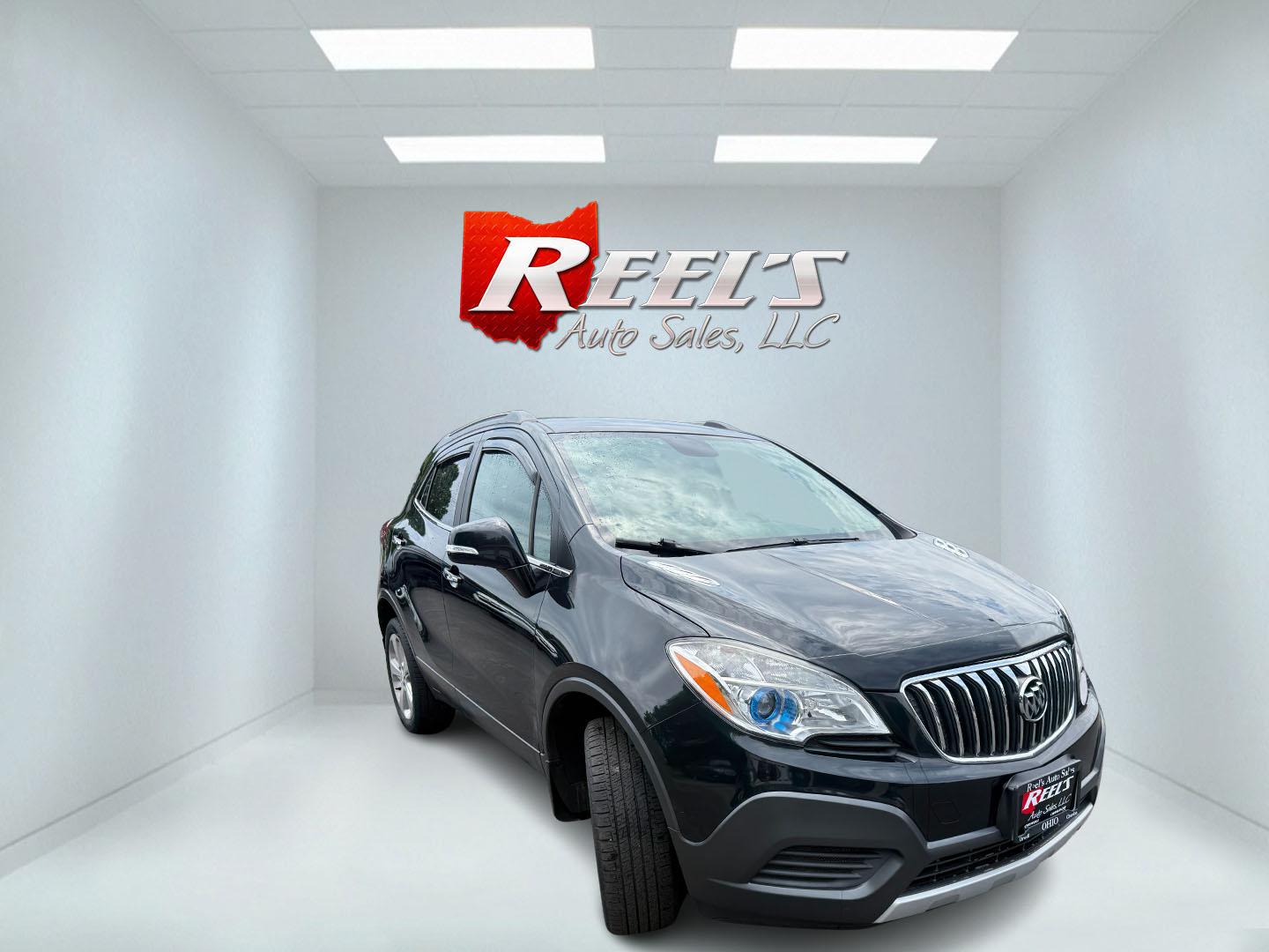 2016 Black /Black Buick Encore Base AWD (KL4CJESBXGB) with an 1.4L I4 DOHC 16V TURBO engine, Automatic transmission, located at 547 E. Main St., Orwell, OH, 44076, (440) 437-5893, 41.535435, -80.847855 - 2016 Buick Encore AWD – Compact Luxury with Turbo Efficiency and All-Weather Grip! This sharp 2016 Buick Encore AWD is a premium compact crossover that delivers refinement, comfort, and strong fuel economy in an easy-to-park size. Powered by a peppy 1.4L Turbocharged EcoTec I4 engine paired with- Photo#2