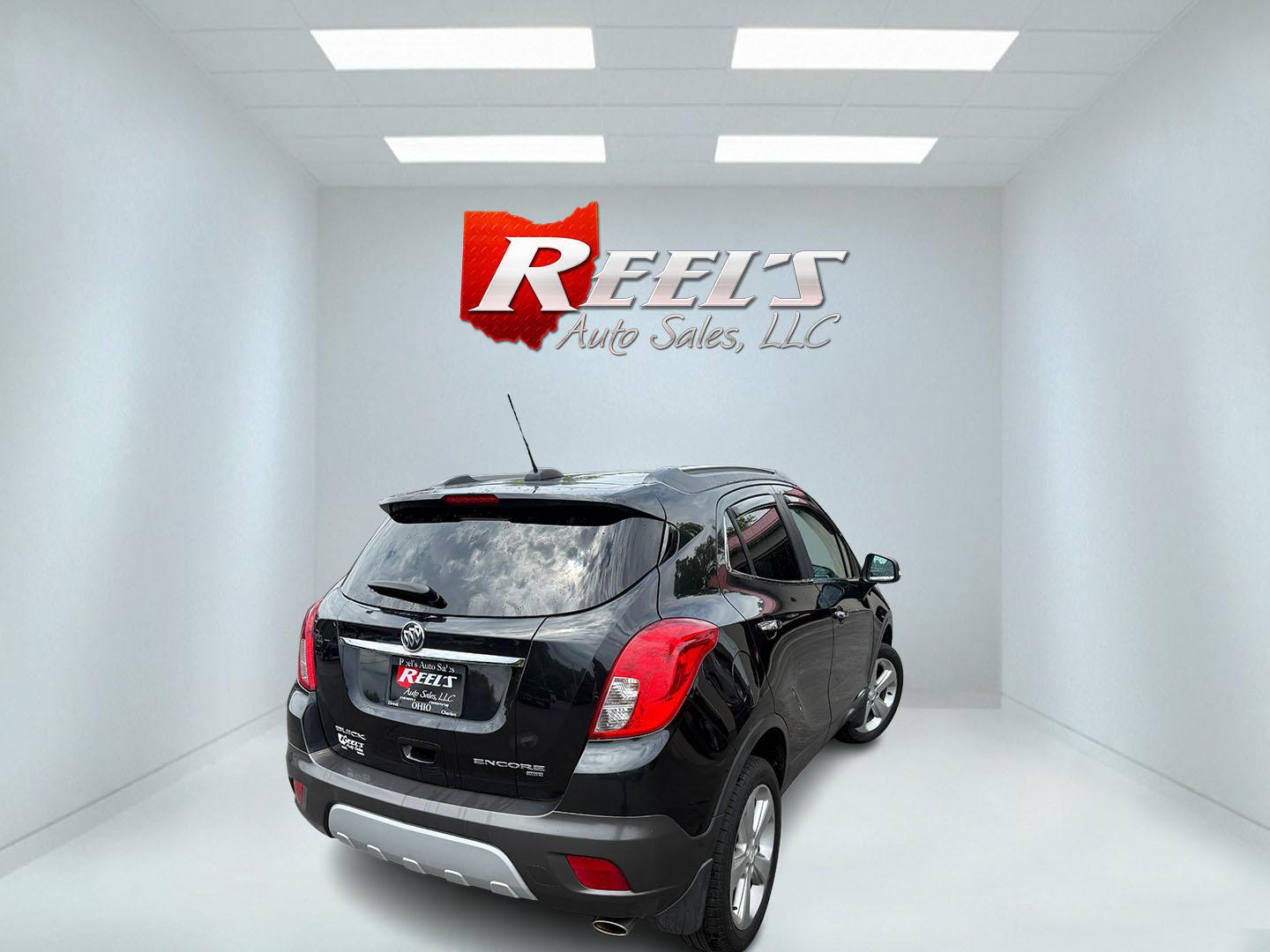 2016 Black /Black Buick Encore Base AWD (KL4CJESBXGB) with an 1.4L I4 DOHC 16V TURBO engine, Automatic transmission, located at 547 E. Main St., Orwell, OH, 44076, (440) 437-5893, 41.535435, -80.847855 - 2016 Buick Encore AWD – Compact Luxury with Turbo Efficiency and All-Weather Grip! This sharp 2016 Buick Encore AWD is a premium compact crossover that delivers refinement, comfort, and strong fuel economy in an easy-to-park size. Powered by a peppy 1.4L Turbocharged EcoTec I4 engine paired with- Photo#22