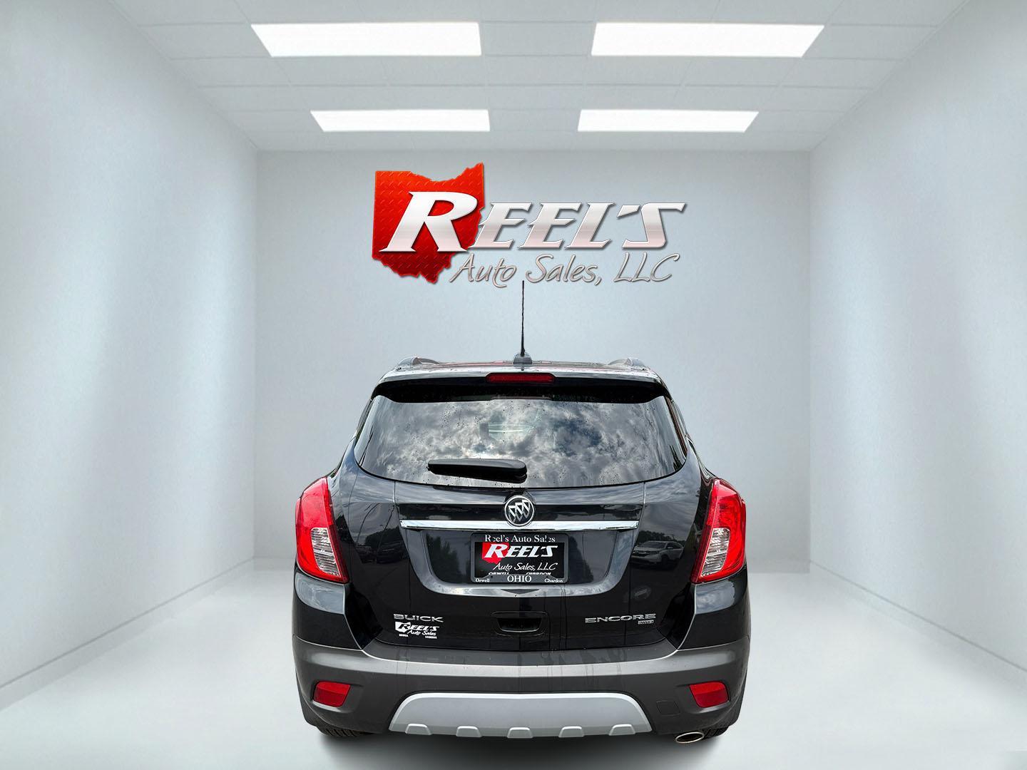 2016 Black /Black Buick Encore Base AWD (KL4CJESBXGB) with an 1.4L I4 DOHC 16V TURBO engine, Automatic transmission, located at 547 E. Main St., Orwell, OH, 44076, (440) 437-5893, 41.535435, -80.847855 - 2016 Buick Encore AWD – Compact Luxury with Turbo Efficiency and All-Weather Grip! This sharp 2016 Buick Encore AWD is a premium compact crossover that delivers refinement, comfort, and strong fuel economy in an easy-to-park size. Powered by a peppy 1.4L Turbocharged EcoTec I4 engine paired with- Photo#23