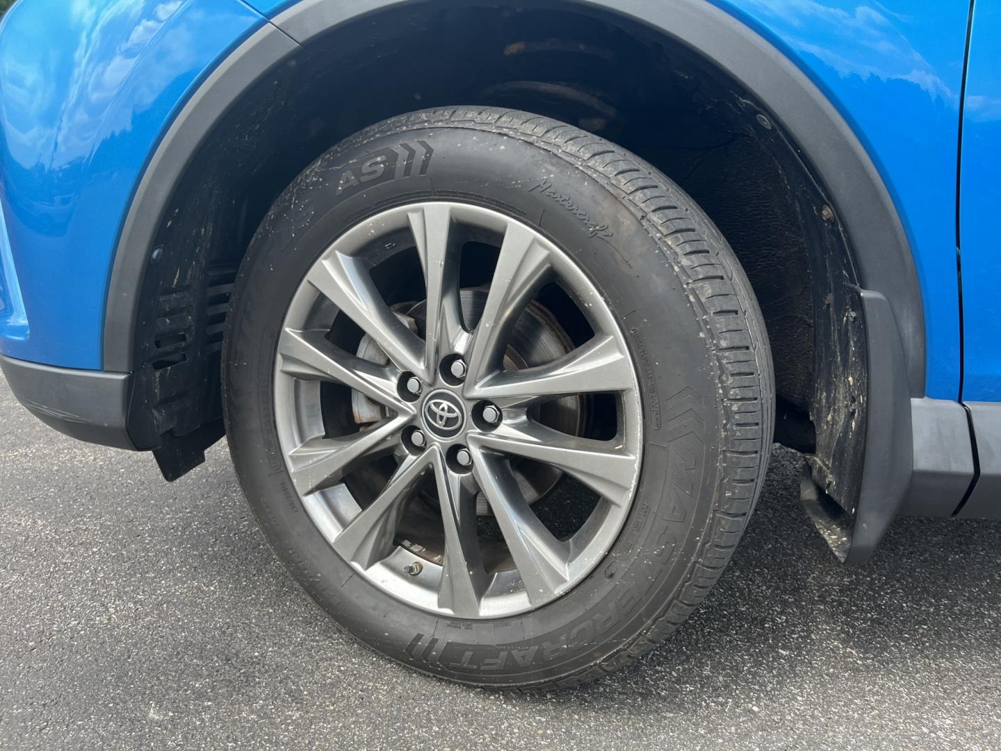 2017 Blue /Black Toyota RAV4 Limited AWD (JTMDFREVXHD) with an 2.5L I4 DOHC 16V engine, Automatic transmission, located at 11115 Chardon Rd. , Chardon, OH, 44024, (440) 214-9705, 41.580246, -81.241943 - 2017 Toyota RAV4 Limited AWD – Premium Compact SUV with Leather, Safety, and Excellent Efficiency! This 2017 Toyota RAV4 Limited AWD is a top-trim model that offers upscale comfort, strong capability, and Toyota’s legendary reliability. Powered by a smooth 2.5L I4 engine paired with a responsiv- Photo#12