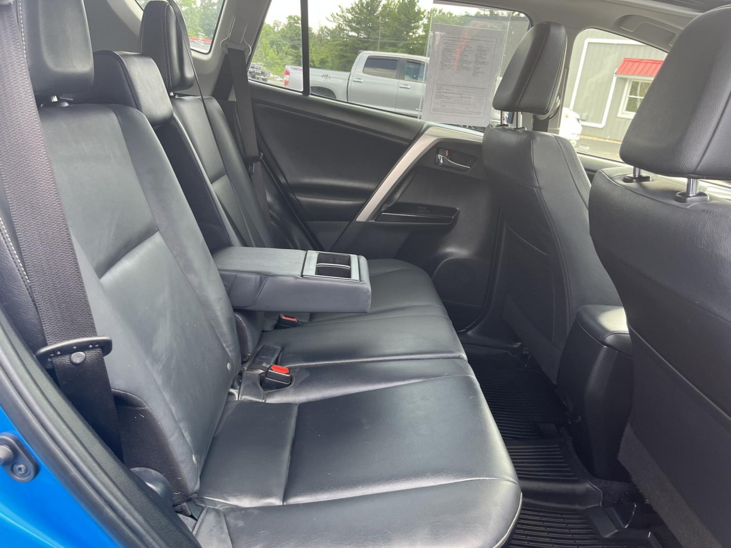 2017 Blue /Black Toyota RAV4 Limited AWD (JTMDFREVXHD) with an 2.5L I4 DOHC 16V engine, Automatic transmission, located at 11115 Chardon Rd. , Chardon, OH, 44024, (440) 214-9705, 41.580246, -81.241943 - 2017 Toyota RAV4 Limited AWD – Premium Compact SUV with Leather, Safety, and Excellent Efficiency! This 2017 Toyota RAV4 Limited AWD is a top-trim model that offers upscale comfort, strong capability, and Toyota’s legendary reliability. Powered by a smooth 2.5L I4 engine paired with a responsiv- Photo#32