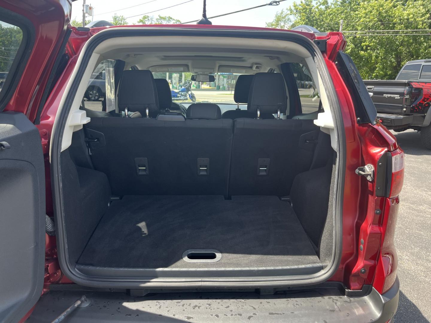 2020 Red /Black Ford EcoSport SE AWD (MAJ6S3GLXLC) with an 2.0L I4 DOHC 16V engine, Automatic transmission, located at 11115 Chardon Rd. , Chardon, OH, 44024, (440) 214-9705, 41.580246, -81.241943 - 2020 Ford EcoSport SE 4WD – Compact, Efficient, and Ready for Daily Adventures! This sharp 2020 Ford EcoSport SE 4WD is a fun, practical, and fuel-efficient small SUV that’s perfect for city driving and weekend getaways. Powered by a responsive 2.0L I4 Duratec engine paired with a smooth 6-spee- Photo#13
