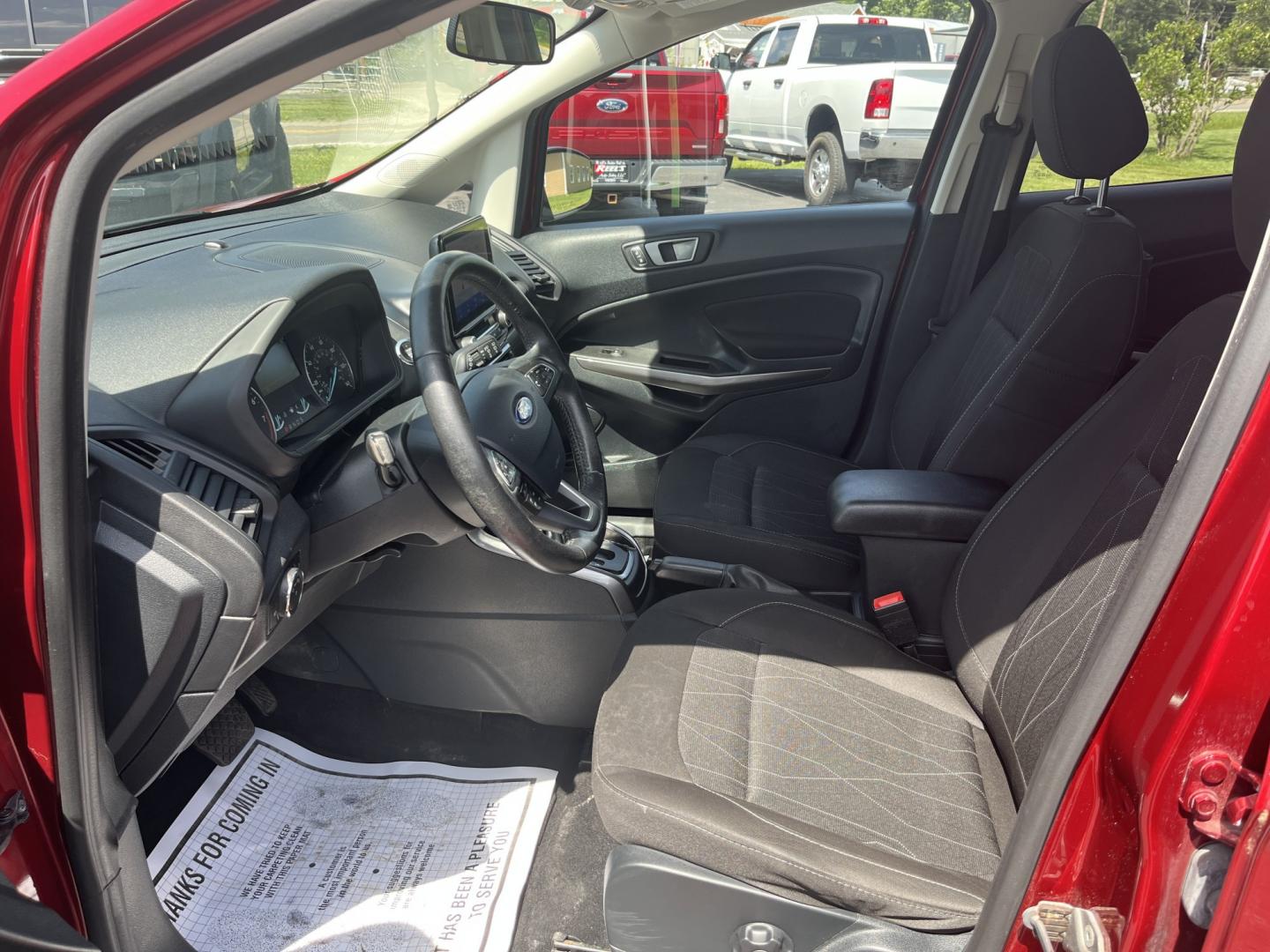 2020 Red /Black Ford EcoSport SE AWD (MAJ6S3GLXLC) with an 2.0L I4 DOHC 16V engine, Automatic transmission, located at 11115 Chardon Rd. , Chardon, OH, 44024, (440) 214-9705, 41.580246, -81.241943 - 2020 Ford EcoSport SE 4WD – Compact, Efficient, and Ready for Daily Adventures! This sharp 2020 Ford EcoSport SE 4WD is a fun, practical, and fuel-efficient small SUV that’s perfect for city driving and weekend getaways. Powered by a responsive 2.0L I4 Duratec engine paired with a smooth 6-spee- Photo#16