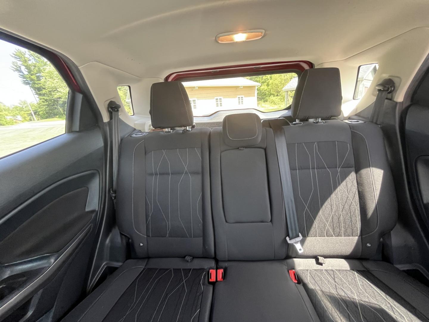 2020 Red /Black Ford EcoSport SE AWD (MAJ6S3GLXLC) with an 2.0L I4 DOHC 16V engine, Automatic transmission, located at 11115 Chardon Rd. , Chardon, OH, 44024, (440) 214-9705, 41.580246, -81.241943 - 2020 Ford EcoSport SE 4WD – Compact, Efficient, and Ready for Daily Adventures! This sharp 2020 Ford EcoSport SE 4WD is a fun, practical, and fuel-efficient small SUV that’s perfect for city driving and weekend getaways. Powered by a responsive 2.0L I4 Duratec engine paired with a smooth 6-spee- Photo#27