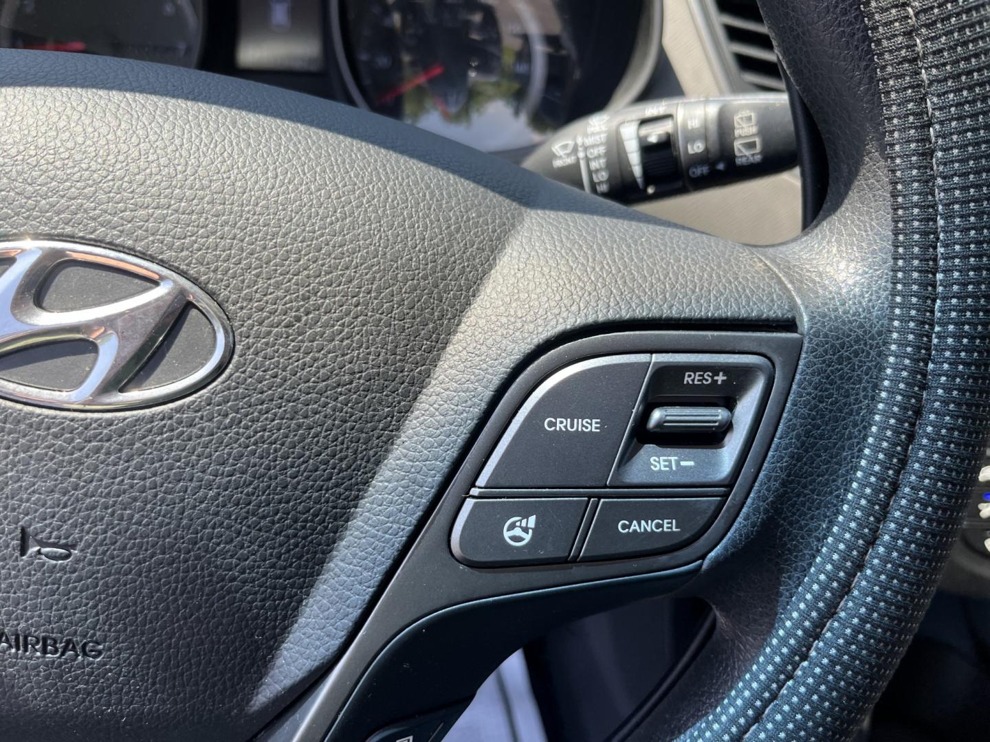 2013 Gray /Black Hyundai Santa Fe Sport 2.4 FWD (5XYZT3LB8DG) with an 2.4L I4 DOHC 16V engine, Automatic transmission, located at 11115 Chardon Rd. , Chardon, OH, 44024, (440) 214-9705, 41.580246, -81.241943 - 2013 Hyundai Santa Fe Sport FWD – Efficient, Versatile, and Ready for Daily Driving! This 2013 Hyundai Santa Fe Sport FWD is a practical and fuel-efficient compact crossover that offers great value and everyday usability. Powered by a responsive 2.4L GDI engine paired with a smooth 6-speed automa- Photo#20