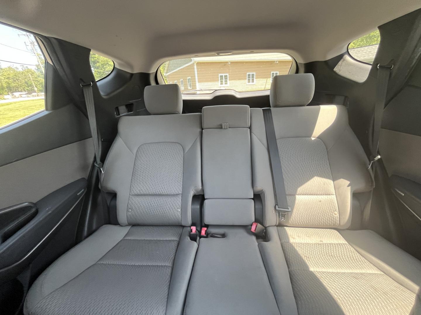 2013 Gray /Black Hyundai Santa Fe Sport 2.4 FWD (5XYZT3LB8DG) with an 2.4L I4 DOHC 16V engine, Automatic transmission, located at 11115 Chardon Rd. , Chardon, OH, 44024, (440) 214-9705, 41.580246, -81.241943 - 2013 Hyundai Santa Fe Sport FWD – Efficient, Versatile, and Ready for Daily Driving! This 2013 Hyundai Santa Fe Sport FWD is a practical and fuel-efficient compact crossover that offers great value and everyday usability. Powered by a responsive 2.4L GDI engine paired with a smooth 6-speed automa- Photo#26