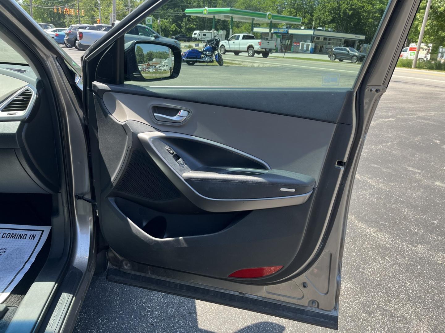 2013 Gray /Black Hyundai Santa Fe Sport 2.4 FWD (5XYZT3LB8DG) with an 2.4L I4 DOHC 16V engine, Automatic transmission, located at 11115 Chardon Rd. , Chardon, OH, 44024, (440) 214-9705, 41.580246, -81.241943 - 2013 Hyundai Santa Fe Sport FWD – Efficient, Versatile, and Ready for Daily Driving! This 2013 Hyundai Santa Fe Sport FWD is a practical and fuel-efficient compact crossover that offers great value and everyday usability. Powered by a responsive 2.4L GDI engine paired with a smooth 6-speed automa- Photo#32