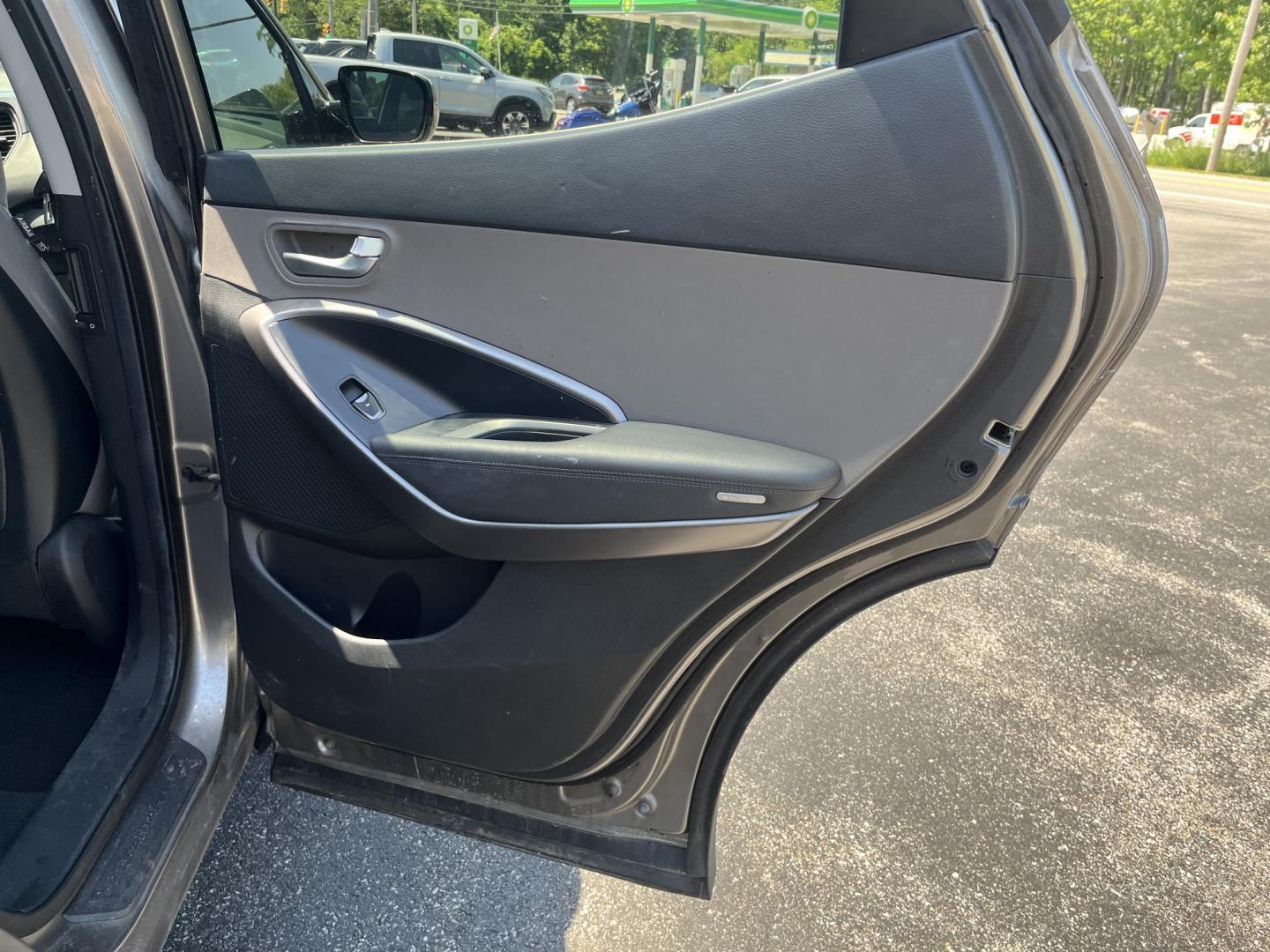 2013 Gray /Black Hyundai Santa Fe Sport 2.4 FWD (5XYZT3LB8DG) with an 2.4L I4 DOHC 16V engine, Automatic transmission, located at 11115 Chardon Rd. , Chardon, OH, 44024, (440) 214-9705, 41.580246, -81.241943 - 2013 Hyundai Santa Fe Sport FWD – Efficient, Versatile, and Ready for Daily Driving! This 2013 Hyundai Santa Fe Sport FWD is a practical and fuel-efficient compact crossover that offers great value and everyday usability. Powered by a responsive 2.4L GDI engine paired with a smooth 6-speed automa- Photo#30
