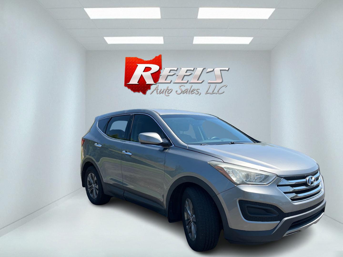 2013 Gray /Black Hyundai Santa Fe Sport 2.4 FWD (5XYZT3LB8DG) with an 2.4L I4 DOHC 16V engine, Automatic transmission, located at 11115 Chardon Rd. , Chardon, OH, 44024, (440) 214-9705, 41.580246, -81.241943 - 2013 Hyundai Santa Fe Sport FWD – Efficient, Versatile, and Ready for Daily Driving! This 2013 Hyundai Santa Fe Sport FWD is a practical and fuel-efficient compact crossover that offers great value and everyday usability. Powered by a responsive 2.4L GDI engine paired with a smooth 6-speed automa- Photo#2