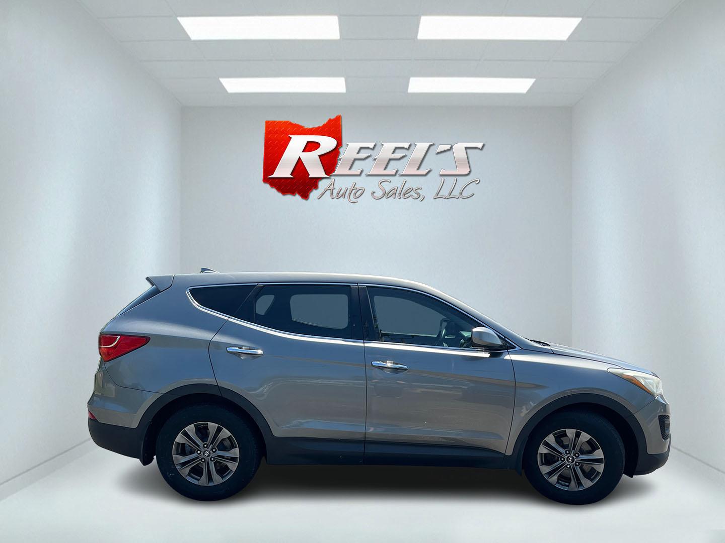 2013 Gray /Black Hyundai Santa Fe Sport 2.4 FWD (5XYZT3LB8DG) with an 2.4L I4 DOHC 16V engine, Automatic transmission, located at 11115 Chardon Rd. , Chardon, OH, 44024, (440) 214-9705, 41.580246, -81.241943 - 2013 Hyundai Santa Fe Sport FWD – Efficient, Versatile, and Ready for Daily Driving! This 2013 Hyundai Santa Fe Sport FWD is a practical and fuel-efficient compact crossover that offers great value and everyday usability. Powered by a responsive 2.4L GDI engine paired with a smooth 6-speed automa- Photo#5