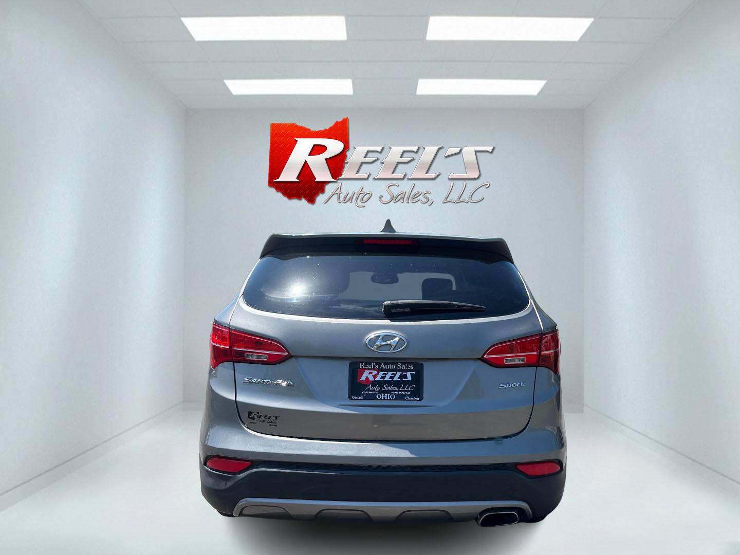 2013 Gray /Black Hyundai Santa Fe Sport 2.4 FWD (5XYZT3LB8DG) with an 2.4L I4 DOHC 16V engine, Automatic transmission, located at 11115 Chardon Rd. , Chardon, OH, 44024, (440) 214-9705, 41.580246, -81.241943 - 2013 Hyundai Santa Fe Sport FWD – Efficient, Versatile, and Ready for Daily Driving! This 2013 Hyundai Santa Fe Sport FWD is a practical and fuel-efficient compact crossover that offers great value and everyday usability. Powered by a responsive 2.4L GDI engine paired with a smooth 6-speed automa- Photo#8