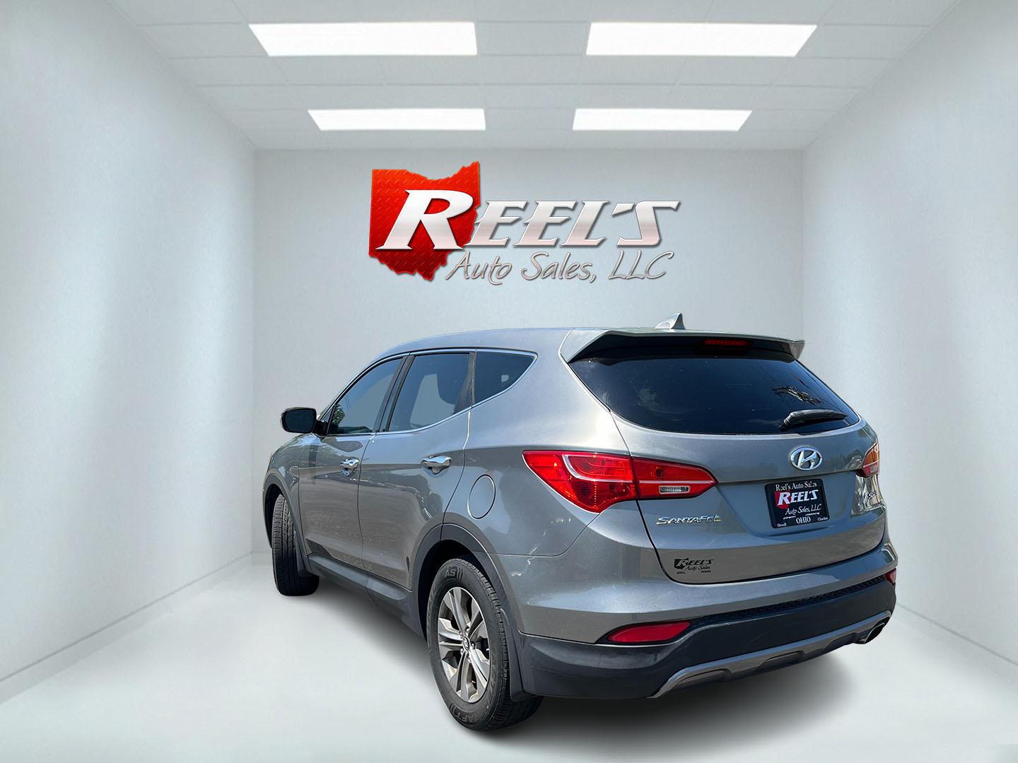 2013 Gray /Black Hyundai Santa Fe Sport 2.4 FWD (5XYZT3LB8DG) with an 2.4L I4 DOHC 16V engine, Automatic transmission, located at 11115 Chardon Rd. , Chardon, OH, 44024, (440) 214-9705, 41.580246, -81.241943 - 2013 Hyundai Santa Fe Sport FWD – Efficient, Versatile, and Ready for Daily Driving! This 2013 Hyundai Santa Fe Sport FWD is a practical and fuel-efficient compact crossover that offers great value and everyday usability. Powered by a responsive 2.4L GDI engine paired with a smooth 6-speed automa- Photo#9