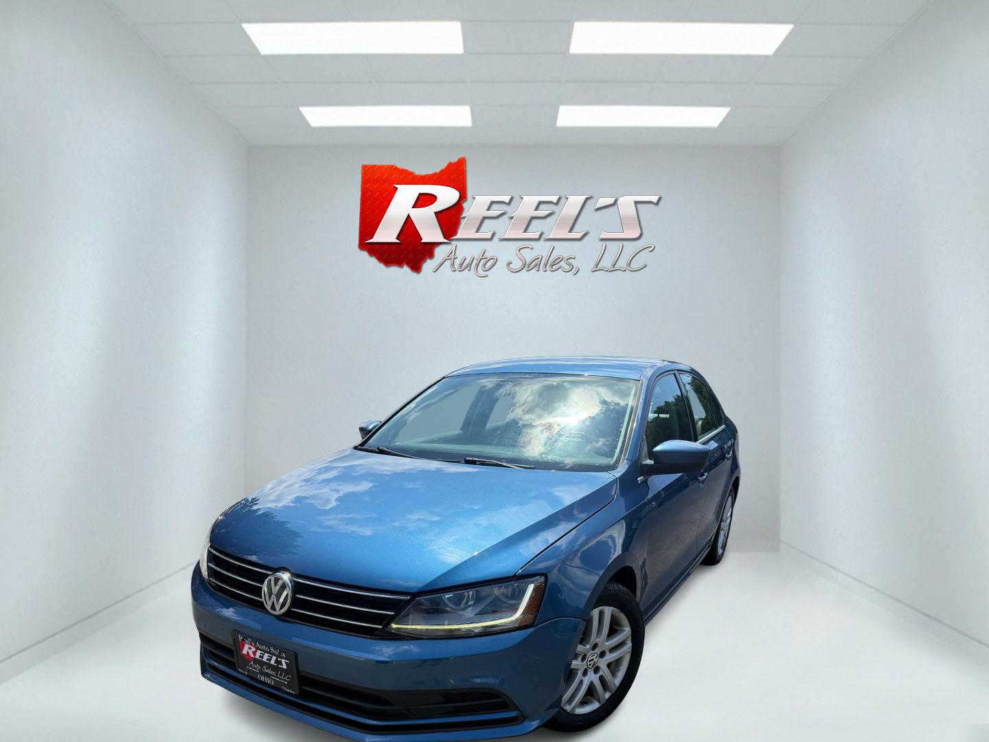 2017 Blue /Gray Volkswagen Jetta S 6A (3VW2B7AJ9HM) with an 1.4L I4 DOHC 16V TURBO engine, Automatic transmission, located at 547 E. Main St., Orwell, OH, 44076, (440) 437-5893, 41.535435, -80.847855 - 2017 Volkswagen Jetta S 6A – Efficient Turbo Sedan with Sport Mode and Modern Tech! This clean 2017 Volkswagen Jetta S 6A is a sharp, fuel-efficient compact sedan that’s perfect for daily commuting and highway cruising. Powered by a responsive 1.4L Turbocharged I4 engine paired with a smooth 6-- Photo#0