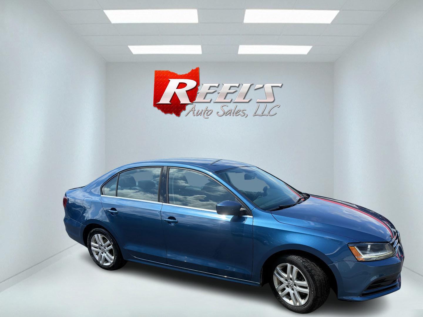 2017 Blue /Gray Volkswagen Jetta S 6A (3VW2B7AJ9HM) with an 1.4L I4 DOHC 16V TURBO engine, Automatic transmission, located at 547 E. Main St., Orwell, OH, 44076, (440) 437-5893, 41.535435, -80.847855 - 2017 Volkswagen Jetta S 6A – Efficient Turbo Sedan with Sport Mode and Modern Tech! This clean 2017 Volkswagen Jetta S 6A is a sharp, fuel-efficient compact sedan that’s perfect for daily commuting and highway cruising. Powered by a responsive 1.4L Turbocharged I4 engine paired with a smooth 6-- Photo#3