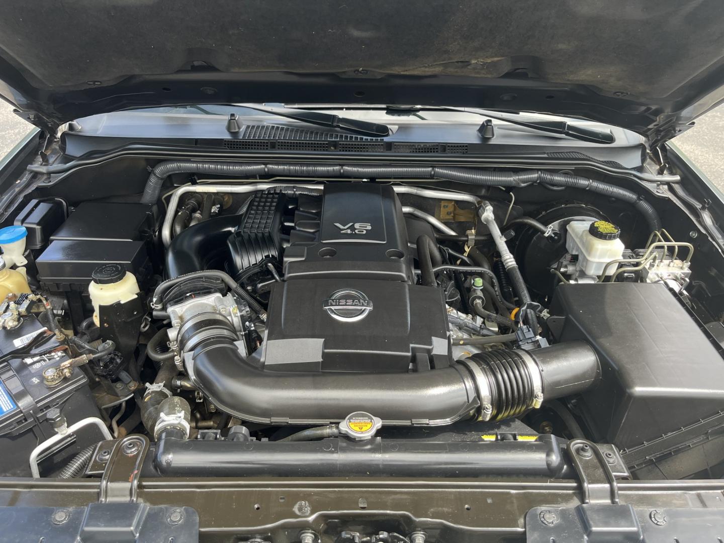 2018 Gray /Gray Nissan Frontier PRO-4X Crew Cab 5AT 4WD (1N6DD0EVXJN) with an 4.0L V6 DOHC 24V FFV engine, Automatic transmission, located at 11115 Chardon Rd. , Chardon, OH, 44024, (440) 214-9705, 41.580246, -81.241943 - 2018 Nissan Frontier Pro-4X Crew Cab 4WD – Off-Road Ready with Bilstein Suspension and Strong Towing Power! This 2018 Nissan Frontier Pro-4X Crew Cab 4WD is a tough, reliable midsize truck built for adventure and hard work. Powered by a proven 4.0L V6 engine paired with a durable 5-speed automati- Photo#13