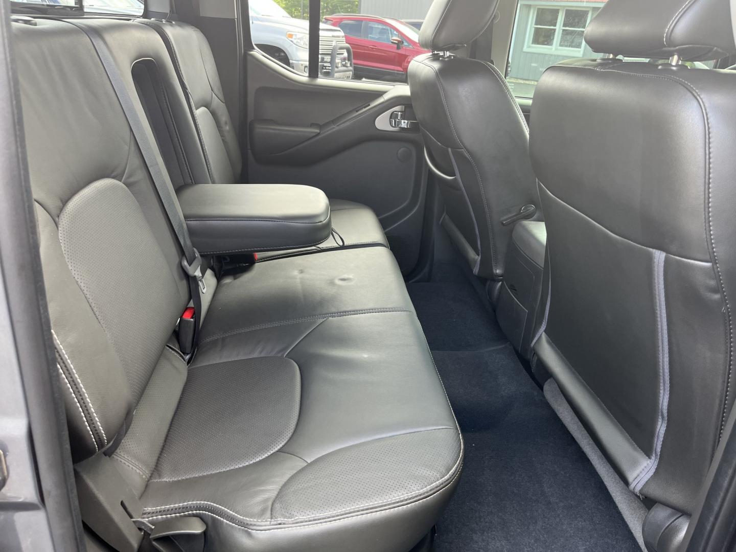 2018 Gray /Gray Nissan Frontier PRO-4X Crew Cab 5AT 4WD (1N6DD0EVXJN) with an 4.0L V6 DOHC 24V FFV engine, Automatic transmission, located at 11115 Chardon Rd. , Chardon, OH, 44024, (440) 214-9705, 41.580246, -81.241943 - 2018 Nissan Frontier Pro-4X Crew Cab 4WD – Off-Road Ready with Bilstein Suspension and Strong Towing Power! This 2018 Nissan Frontier Pro-4X Crew Cab 4WD is a tough, reliable midsize truck built for adventure and hard work. Powered by a proven 4.0L V6 engine paired with a durable 5-speed automati- Photo#33