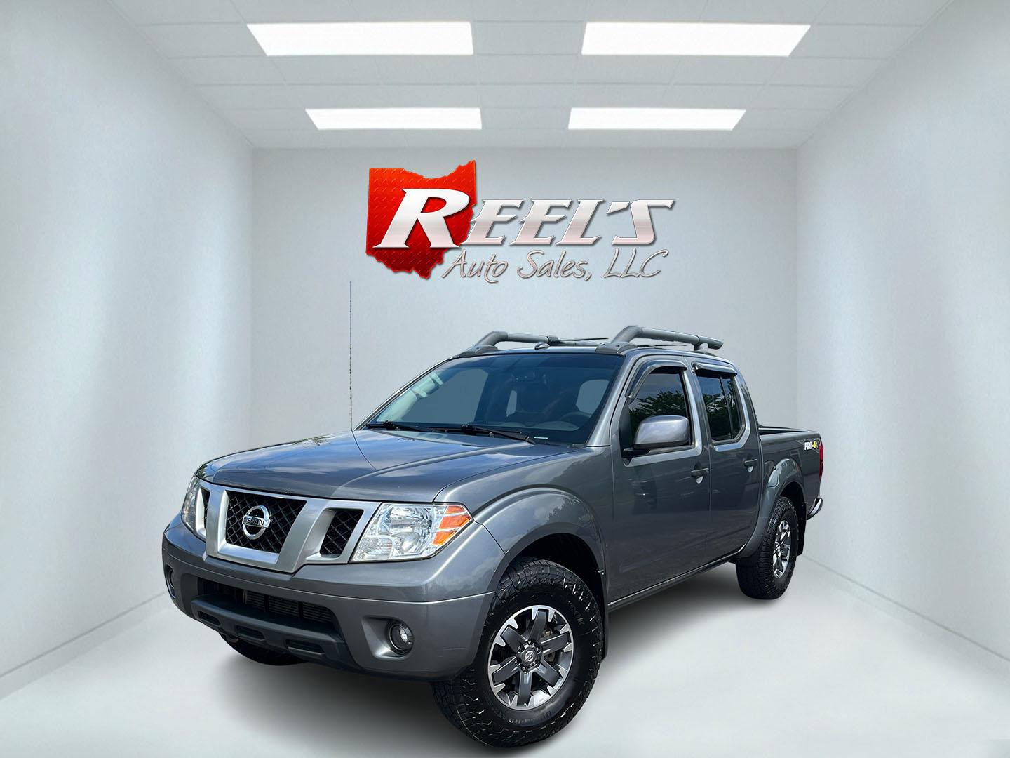 2018 Gray /Gray Nissan Frontier PRO-4X Crew Cab 5AT 4WD (1N6DD0EVXJN) with an 4.0L V6 DOHC 24V FFV engine, Automatic transmission, located at 11115 Chardon Rd. , Chardon, OH, 44024, (440) 214-9705, 41.580246, -81.241943 - 2018 Nissan Frontier Pro-4X Crew Cab 4WD – Off-Road Ready with Bilstein Suspension and Strong Towing Power! This 2018 Nissan Frontier Pro-4X Crew Cab 4WD is a tough, reliable midsize truck built for adventure and hard work. Powered by a proven 4.0L V6 engine paired with a durable 5-speed automati- Photo#0