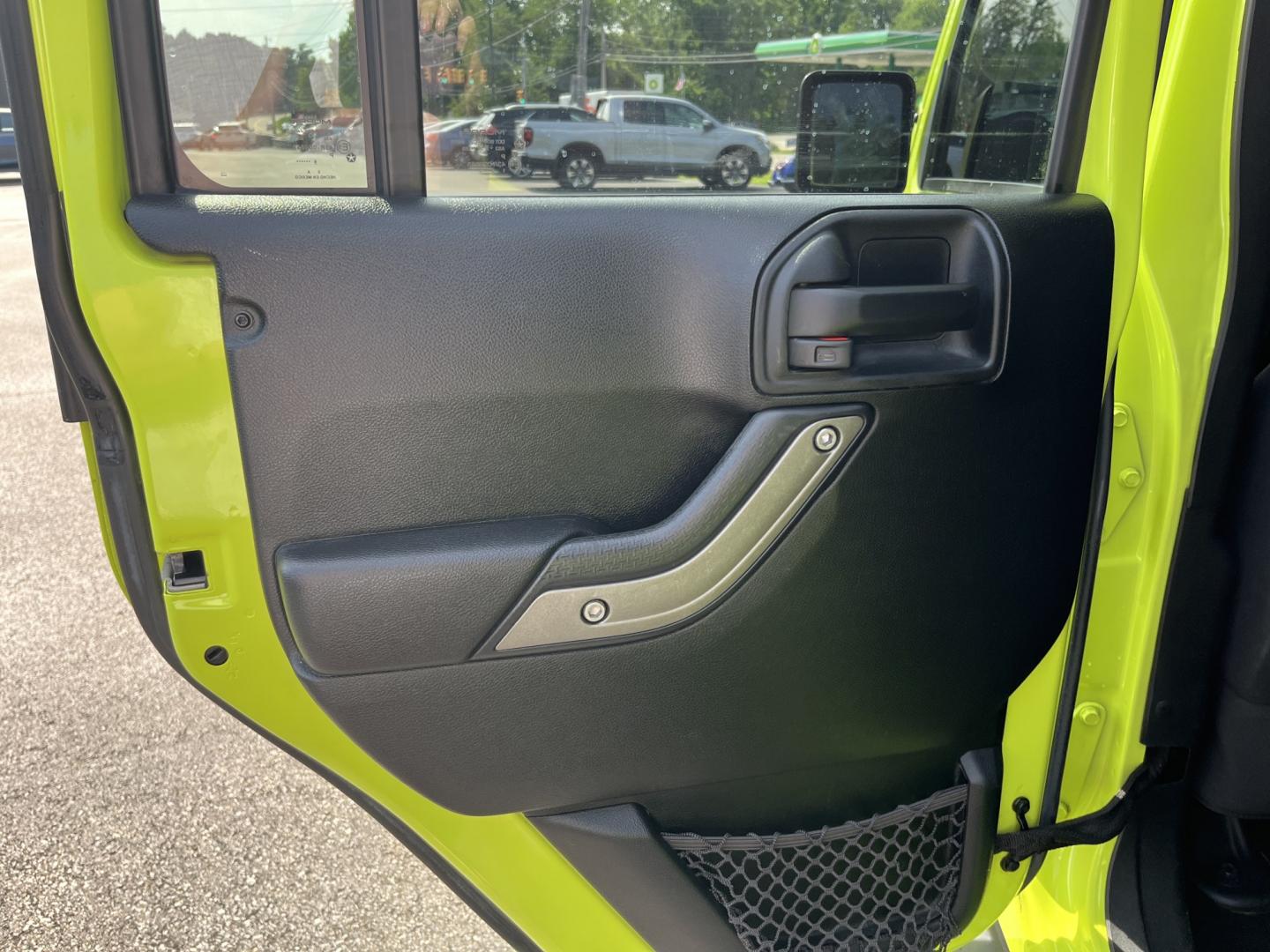2016 Green /Black Jeep Wrangler Unlimited Sport S 4WD (1C4HJWDG9GL) with an 3.6L V6 DOHC 24V engine, Automatic transmission, located at 11115 Chardon Rd. , Chardon, OH, 44024, (440) 214-9705, 41.580246, -81.241943 - 2016 Jeep Wrangler Unlimited Sport S 4WD – New Mexico Jeep with Hyper Green Color and Fresh Kenda A/T Tires! This 2016 Jeep Wrangler Unlimited Sport S is a clean, capable 4-door ready for trails, daily driving, or weekend adventures. Powered by the reliable 3.6L Pentastar V6 engine paired with a- Photo#25
