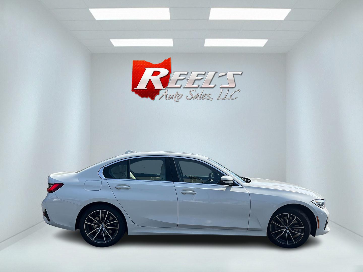 2021 White /Black BMW 3-Series 330i xDrive (3MW5R7J05M8) with an 2.0L I4 DOHC 16V engine, Automatic transmission, located at 547 E. Main St., Orwell, OH, 44076, (440) 437-5893, 41.535435, -80.847855 - 2021 BMW 330i xDrive – Sporty Luxury Sedan with Turbo Performance and Premium Technology! This 2021 BMW 330i xDrive is a refined and dynamic midsize sedan that offers engaging performance and all-weather confidence. Powered by a responsive 2.0L Turbocharged I4 engine paired with a smooth 8-speed- Photo#5