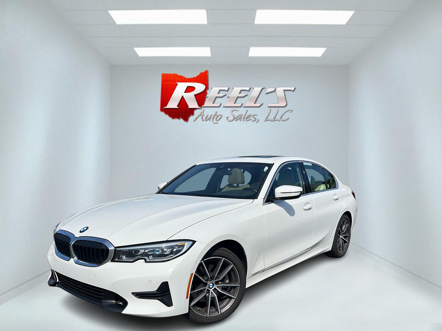 2021 White /Black BMW 3-Series 330i xDrive (3MW5R7J05M8) with an 2.0L I4 DOHC 16V engine, Automatic transmission, located at 547 E. Main St., Orwell, OH, 44076, (440) 437-5893, 41.535435, -80.847855 - 2021 BMW 330i xDrive – Sporty Luxury Sedan with Turbo Performance and Premium Technology! This 2021 BMW 330i xDrive is a refined and dynamic midsize sedan that offers engaging performance and all-weather confidence. Powered by a responsive 2.0L Turbocharged I4 engine paired with a smooth 8-speed- Photo#0