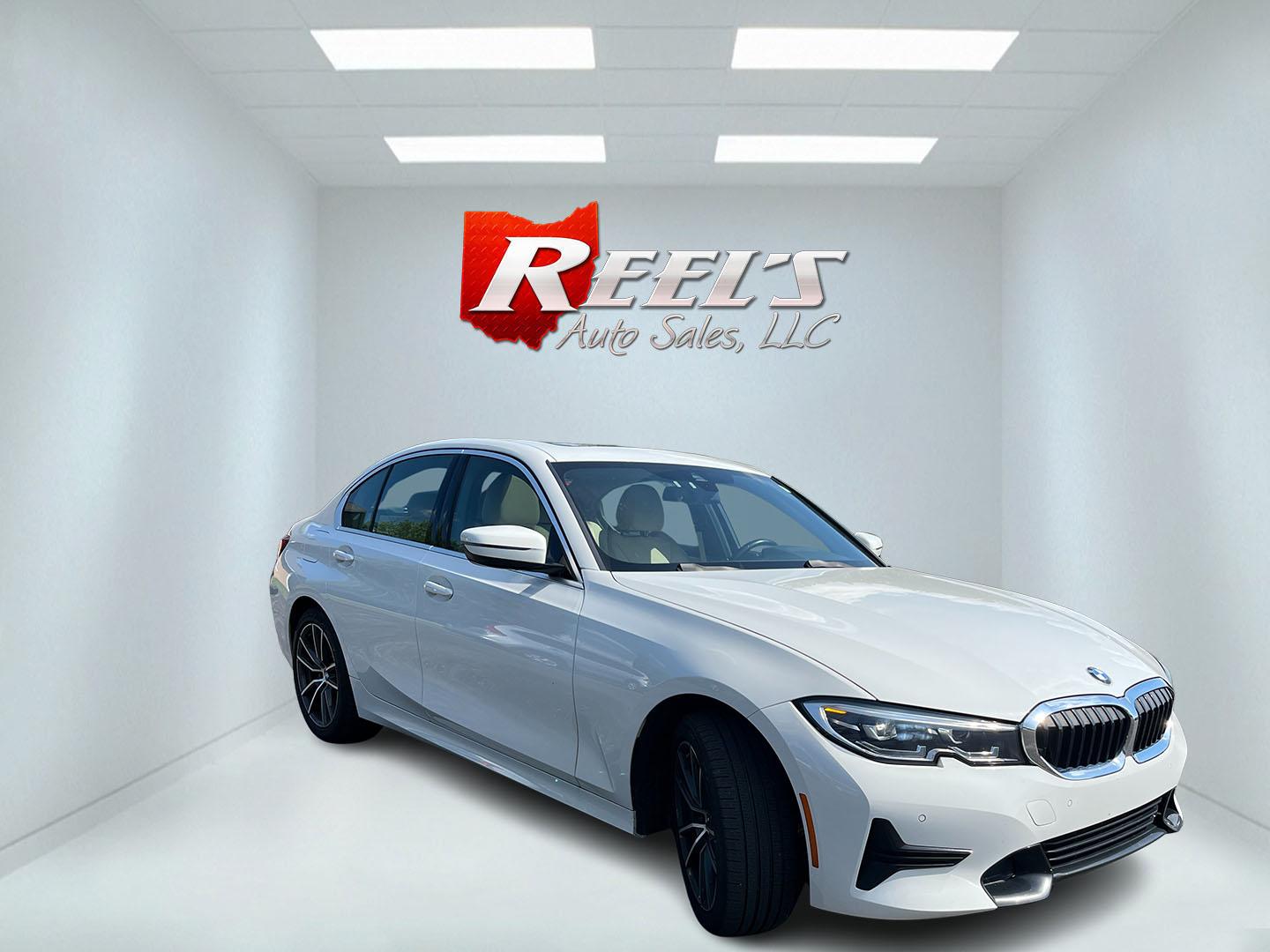 2021 White /Black BMW 3-Series 330i xDrive (3MW5R7J05M8) with an 2.0L I4 DOHC 16V engine, Automatic transmission, located at 547 E. Main St., Orwell, OH, 44076, (440) 437-5893, 41.535435, -80.847855 - 2021 BMW 330i xDrive – Sporty Luxury Sedan with Turbo Performance and Premium Technology! This 2021 BMW 330i xDrive is a refined and dynamic midsize sedan that offers engaging performance and all-weather confidence. Powered by a responsive 2.0L Turbocharged I4 engine paired with a smooth 8-speed- Photo#2