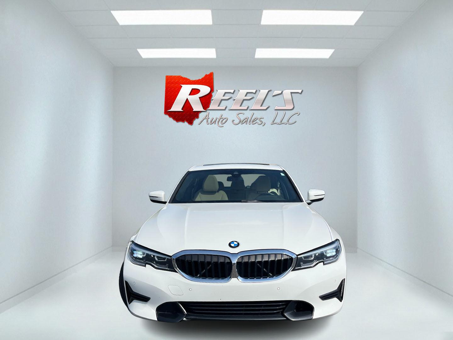 2021 White /Black BMW 3-Series 330i xDrive (3MW5R7J05M8) with an 2.0L I4 DOHC 16V engine, Automatic transmission, located at 547 E. Main St., Orwell, OH, 44076, (440) 437-5893, 41.535435, -80.847855 - 2021 BMW 330i xDrive – Sporty Luxury Sedan with Turbo Performance and Premium Technology! This 2021 BMW 330i xDrive is a refined and dynamic midsize sedan that offers engaging performance and all-weather confidence. Powered by a responsive 2.0L Turbocharged I4 engine paired with a smooth 8-speed- Photo#1