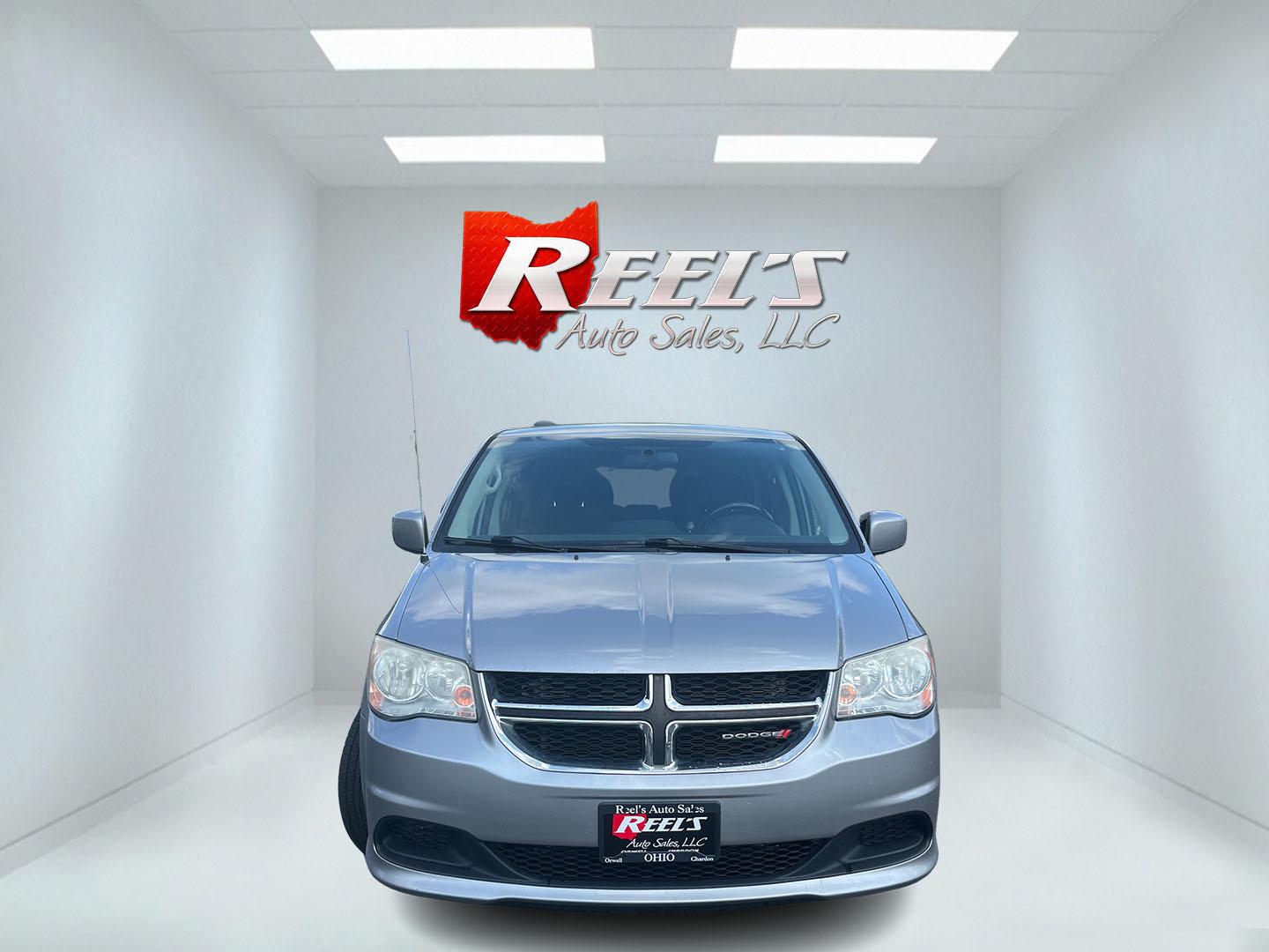 2013 Silver /Black Dodge Grand Caravan SXT (2C4RDGCG8DR) with an 3.6L V6 DOHC 24V FFV engine, Automatic transmission, located at 11115 Chardon Rd. , Chardon, OH, 44024, (440) 214-9705, 41.580246, -81.241943 - 2013 Dodge Grand Caravan SXT – Spacious Family Minivan with Stow ’n Go and Rear Entertainment! This 2013 Dodge Grand Caravan SXT is a practical and family-friendly minivan that offers generous space and versatile seating. Powered by a smooth 3.6L Pentastar V6 engine paired with a responsive 6-s- Photo#1