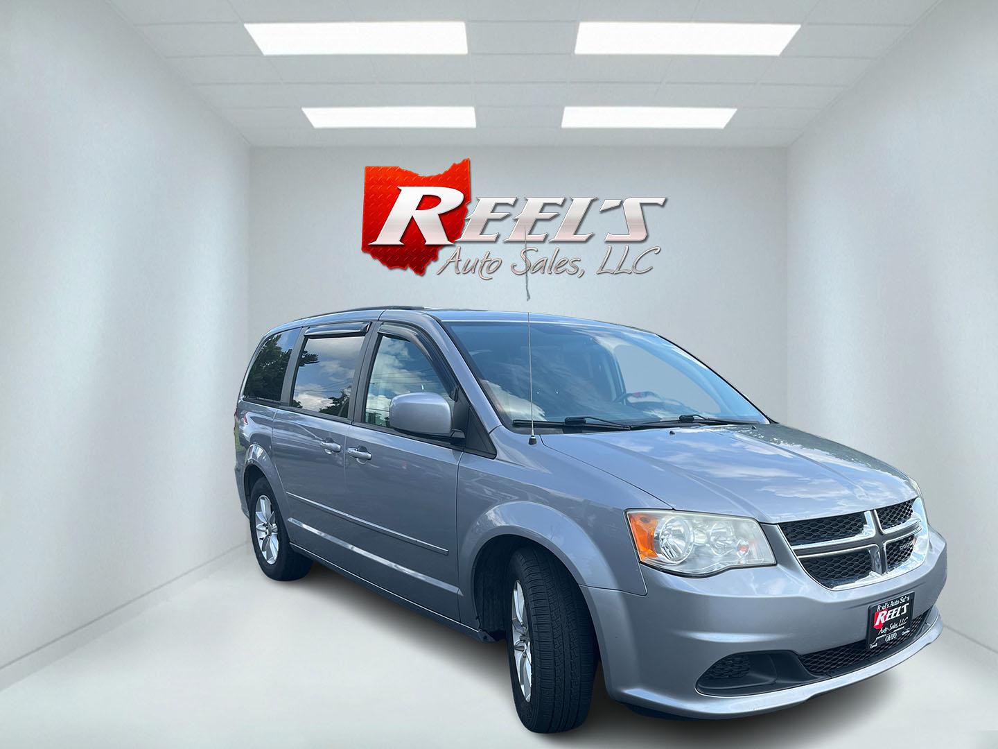 2013 Silver /Black Dodge Grand Caravan SXT (2C4RDGCG8DR) with an 3.6L V6 DOHC 24V FFV engine, Automatic transmission, located at 11115 Chardon Rd. , Chardon, OH, 44024, (440) 214-9705, 41.580246, -81.241943 - 2013 Dodge Grand Caravan SXT – Spacious Family Minivan with Stow ’n Go and Rear Entertainment! This 2013 Dodge Grand Caravan SXT is a practical and family-friendly minivan that offers generous space and versatile seating. Powered by a smooth 3.6L Pentastar V6 engine paired with a responsive 6-s- Photo#2
