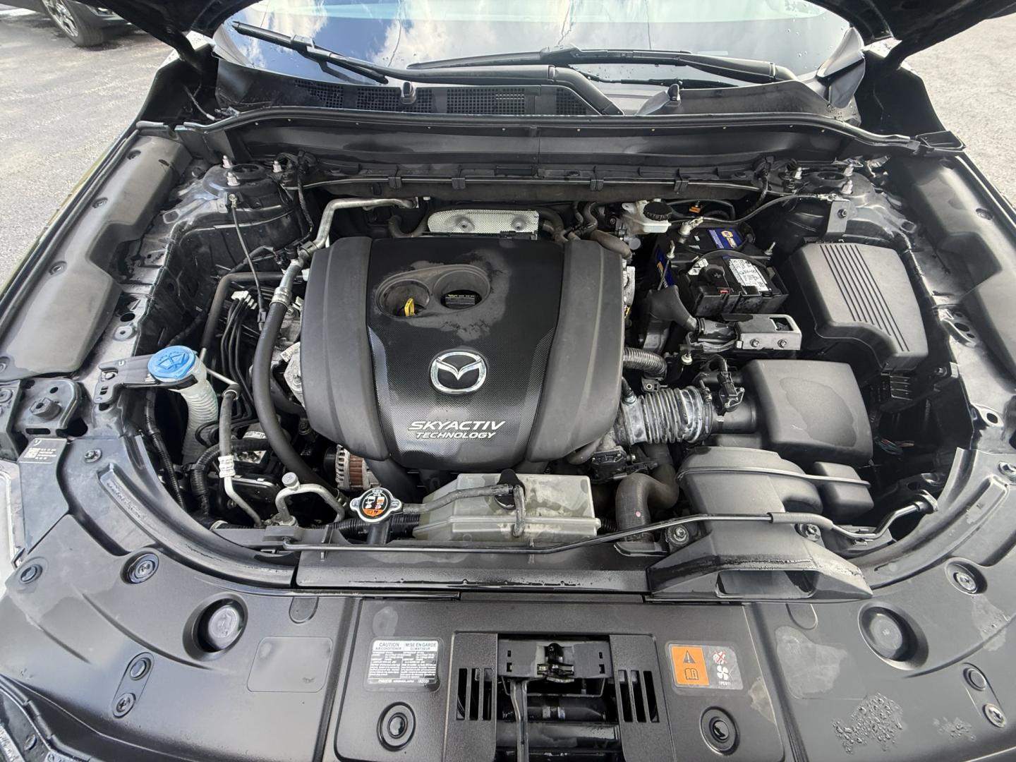 2019 Black /Black Mazda CX-5 Grand Touring AWD (JM3KFBDM2K0) with an 2.5L I4 DOHC 16V engine, Automatic transmission, located at 11115 Chardon Rd. , Chardon, OH, 44024, (440) 214-9705, 41.580246, -81.241943 - 2019 Mazda CX-5 Grand Touring AWD – Premium Compact SUV with Leather, BOSE Sound, and Sporty Dynamics! This 2019 Mazda CX-5 Grand Touring AWD is a refined and engaging compact crossover that offers upscale comfort and fun-to-drive performance. Powered by a smooth 2.5L I4 engine paired with a resp- Photo#7