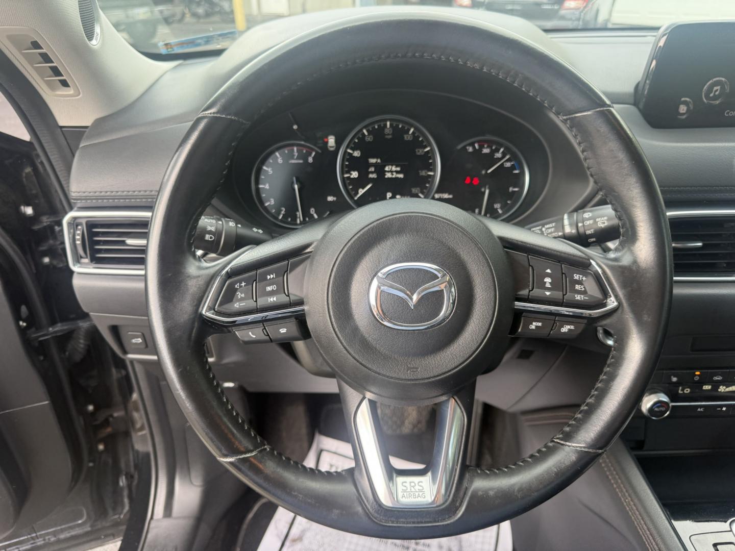 2019 Black /Black Mazda CX-5 Grand Touring AWD (JM3KFBDM2K0) with an 2.5L I4 DOHC 16V engine, Automatic transmission, located at 11115 Chardon Rd. , Chardon, OH, 44024, (440) 214-9705, 41.580246, -81.241943 - 2019 Mazda CX-5 Grand Touring AWD – Premium Compact SUV with Leather, BOSE Sound, and Sporty Dynamics! This 2019 Mazda CX-5 Grand Touring AWD is a refined and engaging compact crossover that offers upscale comfort and fun-to-drive performance. Powered by a smooth 2.5L I4 engine paired with a resp- Photo#15
