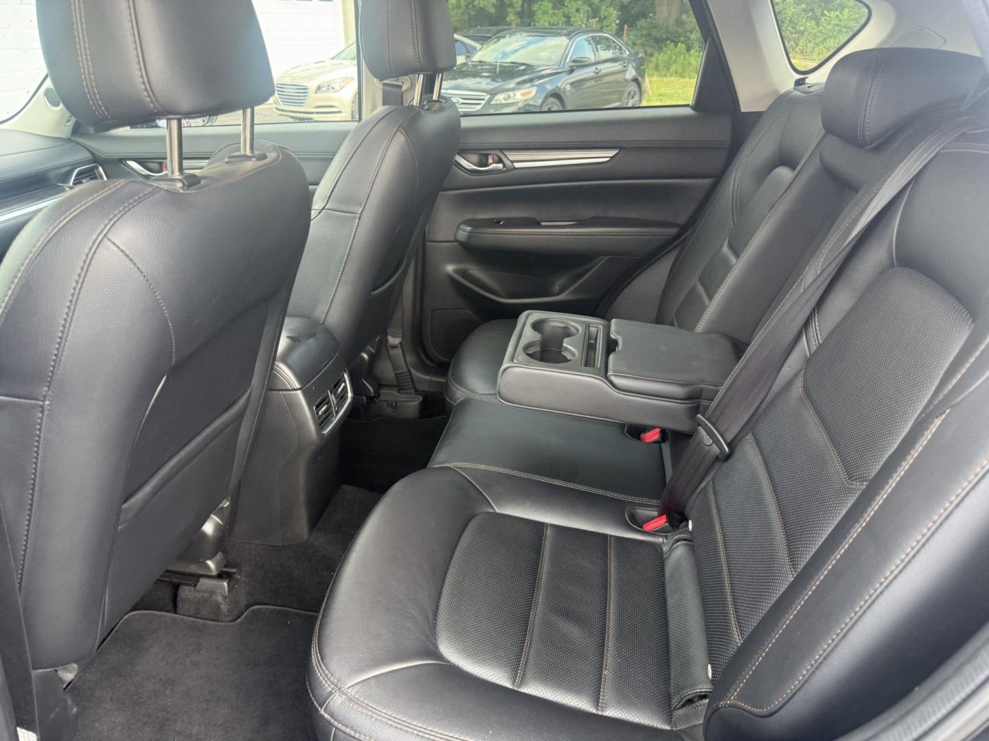 2019 Black /Black Mazda CX-5 Grand Touring AWD (JM3KFBDM2K0) with an 2.5L I4 DOHC 16V engine, Automatic transmission, located at 11115 Chardon Rd. , Chardon, OH, 44024, (440) 214-9705, 41.580246, -81.241943 - 2019 Mazda CX-5 Grand Touring AWD – Premium Compact SUV with Leather, BOSE Sound, and Sporty Dynamics! This 2019 Mazda CX-5 Grand Touring AWD is a refined and engaging compact crossover that offers upscale comfort and fun-to-drive performance. Powered by a smooth 2.5L I4 engine paired with a resp- Photo#25