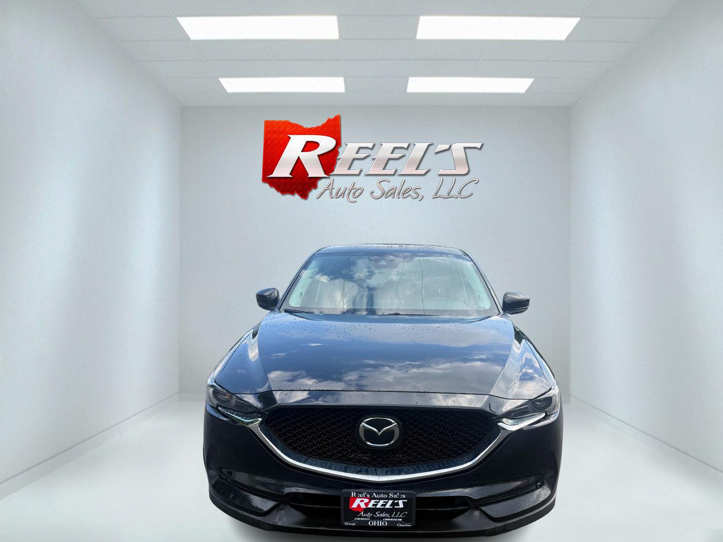2019 Black /Black Mazda CX-5 Grand Touring AWD (JM3KFBDM2K0) with an 2.5L I4 DOHC 16V engine, Automatic transmission, located at 11115 Chardon Rd. , Chardon, OH, 44024, (440) 214-9705, 41.580246, -81.241943 - 2019 Mazda CX-5 Grand Touring AWD – Premium Compact SUV with Leather, BOSE Sound, and Sporty Dynamics! This 2019 Mazda CX-5 Grand Touring AWD is a refined and engaging compact crossover that offers upscale comfort and fun-to-drive performance. Powered by a smooth 2.5L I4 engine paired with a resp- Photo#2