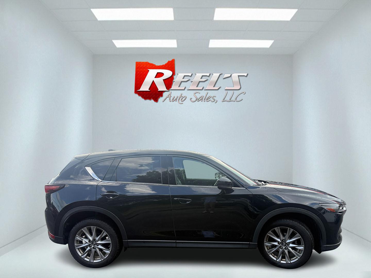 2019 Black /Black Mazda CX-5 Grand Touring AWD (JM3KFBDM2K0) with an 2.5L I4 DOHC 16V engine, Automatic transmission, located at 11115 Chardon Rd. , Chardon, OH, 44024, (440) 214-9705, 41.580246, -81.241943 - 2019 Mazda CX-5 Grand Touring AWD – Premium Compact SUV with Leather, BOSE Sound, and Sporty Dynamics! This 2019 Mazda CX-5 Grand Touring AWD is a refined and engaging compact crossover that offers upscale comfort and fun-to-drive performance. Powered by a smooth 2.5L I4 engine paired with a resp- Photo#33