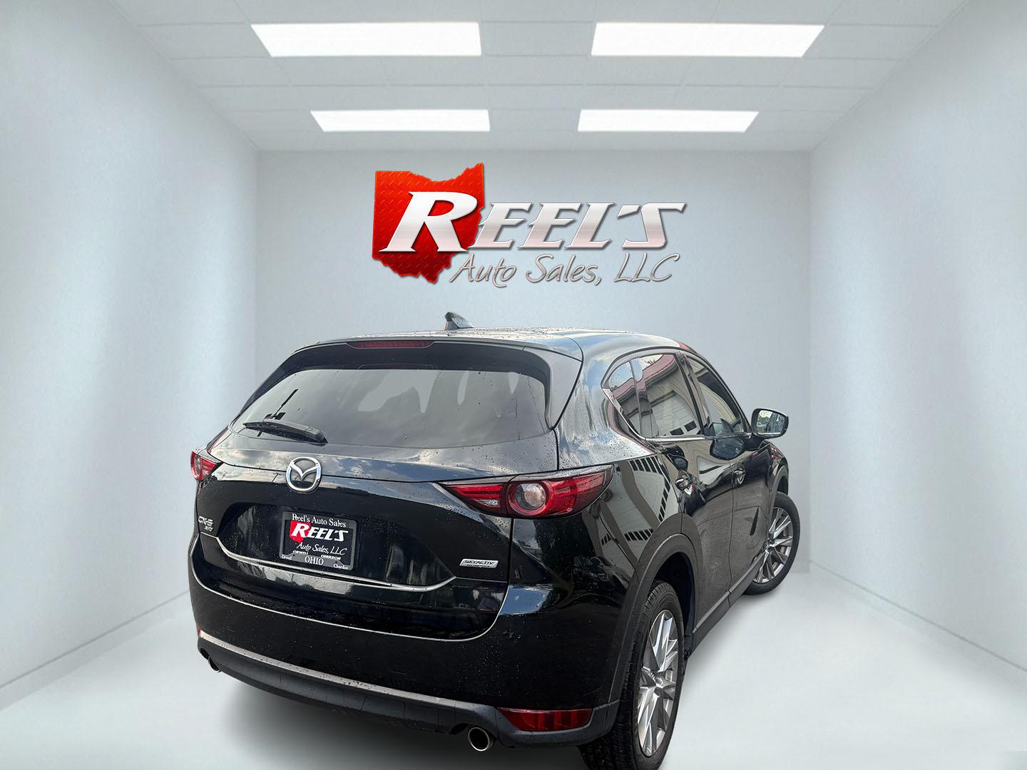 2019 Black /Black Mazda CX-5 Grand Touring AWD (JM3KFBDM2K0) with an 2.5L I4 DOHC 16V engine, Automatic transmission, located at 11115 Chardon Rd. , Chardon, OH, 44024, (440) 214-9705, 41.580246, -81.241943 - 2019 Mazda CX-5 Grand Touring AWD – Premium Compact SUV with Leather, BOSE Sound, and Sporty Dynamics! This 2019 Mazda CX-5 Grand Touring AWD is a refined and engaging compact crossover that offers upscale comfort and fun-to-drive performance. Powered by a smooth 2.5L I4 engine paired with a resp- Photo#35