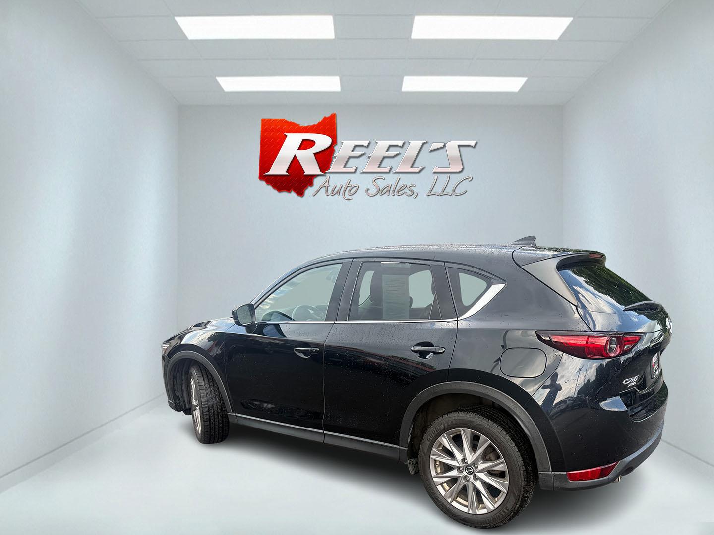 2019 Black /Black Mazda CX-5 Grand Touring AWD (JM3KFBDM2K0) with an 2.5L I4 DOHC 16V engine, Automatic transmission, located at 11115 Chardon Rd. , Chardon, OH, 44024, (440) 214-9705, 41.580246, -81.241943 - 2019 Mazda CX-5 Grand Touring AWD – Premium Compact SUV with Leather, BOSE Sound, and Sporty Dynamics! This 2019 Mazda CX-5 Grand Touring AWD is a refined and engaging compact crossover that offers upscale comfort and fun-to-drive performance. Powered by a smooth 2.5L I4 engine paired with a resp- Photo#38