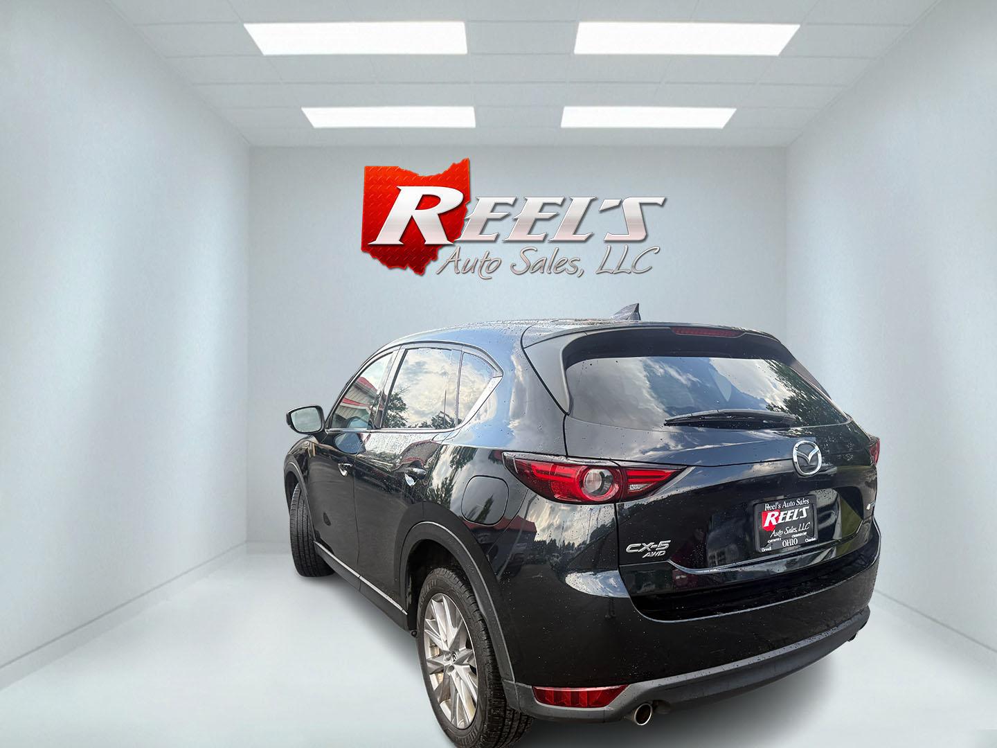 2019 Black /Black Mazda CX-5 Grand Touring AWD (JM3KFBDM2K0) with an 2.5L I4 DOHC 16V engine, Automatic transmission, located at 11115 Chardon Rd. , Chardon, OH, 44024, (440) 214-9705, 41.580246, -81.241943 - 2019 Mazda CX-5 Grand Touring AWD – Premium Compact SUV with Leather, BOSE Sound, and Sporty Dynamics! This 2019 Mazda CX-5 Grand Touring AWD is a refined and engaging compact crossover that offers upscale comfort and fun-to-drive performance. Powered by a smooth 2.5L I4 engine paired with a resp- Photo#37