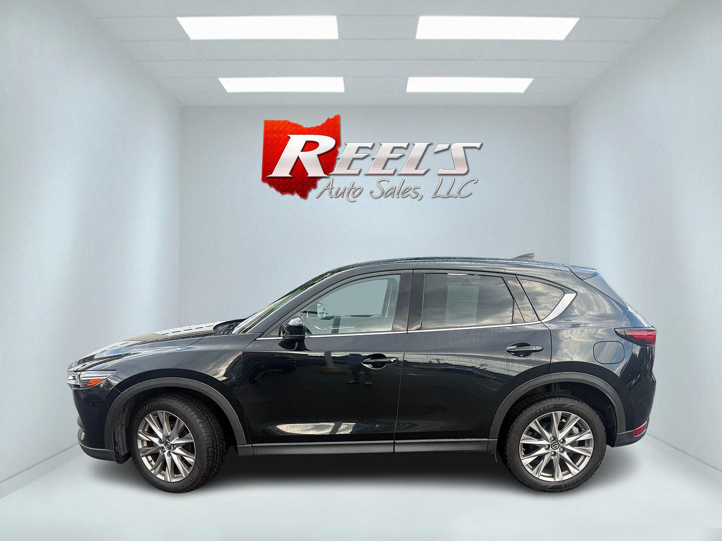 2019 Black /Black Mazda CX-5 Grand Touring AWD (JM3KFBDM2K0) with an 2.5L I4 DOHC 16V engine, Automatic transmission, located at 11115 Chardon Rd. , Chardon, OH, 44024, (440) 214-9705, 41.580246, -81.241943 - 2019 Mazda CX-5 Grand Touring AWD – Premium Compact SUV with Leather, BOSE Sound, and Sporty Dynamics! This 2019 Mazda CX-5 Grand Touring AWD is a refined and engaging compact crossover that offers upscale comfort and fun-to-drive performance. Powered by a smooth 2.5L I4 engine paired with a resp- Photo#40