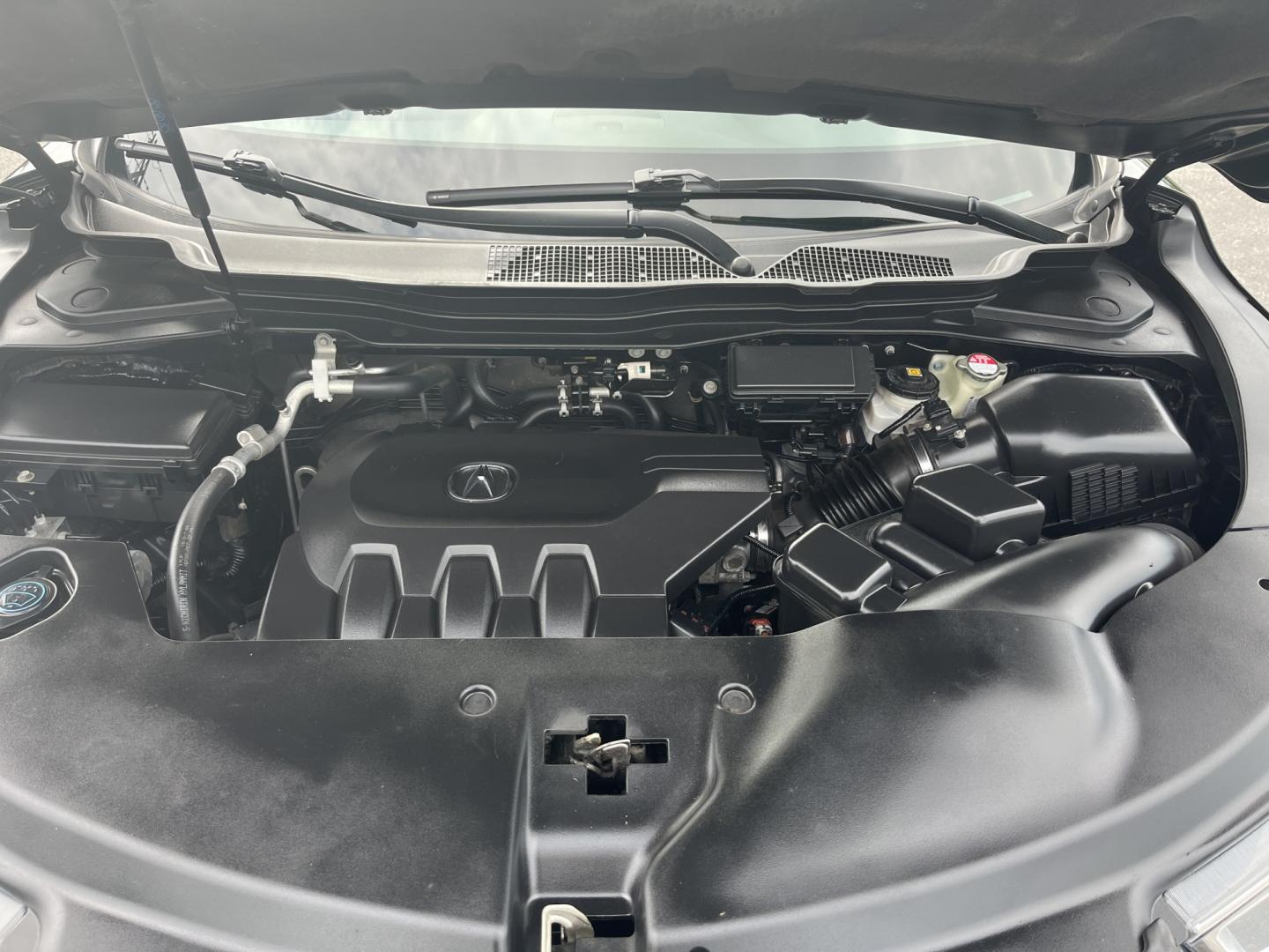 2017 Black /BLack Acura MDX Sport Hybrid SH-AWD w/Advance Package (5FRYD7H76HB) with an 3.0L V6 DOHC 24V HYBRID engine, Automatic transmission, located at 547 E. Main St., Orwell, OH, 44076, (440) 437-5893, 41.535435, -80.847855 - 2017 Acura MDX Sport Hybrid AWD – Luxury 3-Row Hybrid SUV with Strong Performance and Premium Features! This 2017 Acura MDX Sport Hybrid AWD is a refined and capable 3-row luxury SUV that combines hybrid efficiency with impressive performance. Powered by a smooth 3.0L V6 hybrid powertrain paired- Photo#13