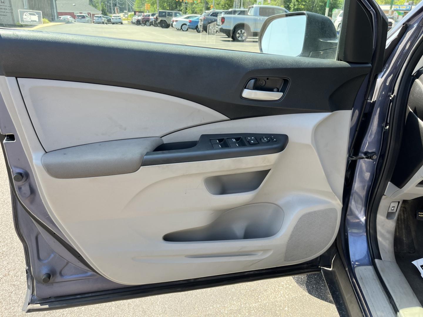 2012 Blue /Gray Honda CR-V LX 4WD 5-Speed AT (5J6RM4H36CL) with an 2.4L I4 DOHC 16V engine, Automatic transmission, located at 11115 Chardon Rd. , Chardon, OH, 44024, (440) 214-9705, 41.580246, -81.241943 - 2012 Honda CR-V LX AWD – Reliable Compact SUV with Great Tires and Modern Upgrades! This 2012 Honda CR-V LX AWD is a clean, reliable, and fuel-efficient compact SUV that’s perfect for daily driving and light adventures. Powered by a smooth 2.4L I4 engine paired with a durable 5-speed automatic- Photo#14