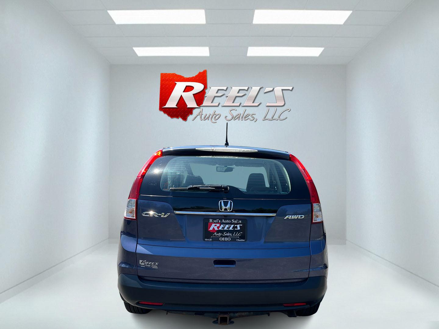 2012 Blue /Gray Honda CR-V LX 4WD 5-Speed AT (5J6RM4H36CL) with an 2.4L I4 DOHC 16V engine, Automatic transmission, located at 11115 Chardon Rd. , Chardon, OH, 44024, (440) 214-9705, 41.580246, -81.241943 - 2012 Honda CR-V LX AWD – Reliable Compact SUV with Great Tires and Modern Upgrades! This 2012 Honda CR-V LX AWD is a clean, reliable, and fuel-efficient compact SUV that’s perfect for daily driving and light adventures. Powered by a smooth 2.4L I4 engine paired with a durable 5-speed automatic- Photo#8