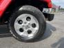 2014 Red /Black Jeep Wrangler Unlimited Sahara 4WD (1C4BJWEG7EL) with an 3.6L V6 DOHC 24V FFV engine, 5-Speed Automatic transmission, located at 547 E. Main St., Orwell, OH, 44076, (440) 437-5893, 41.535435, -80.847855 - 2014 Jeep Wrangler Unlimited Sahara 4WD – Flame Red with Trail Rated Capability and Classic Wrangler Style! This 2014 Jeep Wrangler Unlimited Sahara is a clean and capable 4-door ready for trails, daily driving, or weekend adventures. Powered by the reliable 3.6L Pentastar V6 engine paired with a- Photo#4