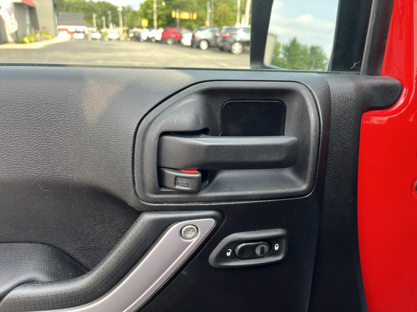 2014 Red /Black Jeep Wrangler Unlimited Sahara 4WD (1C4BJWEG7EL) with an 3.6L V6 DOHC 24V FFV engine, 5-Speed Automatic transmission, located at 547 E. Main St., Orwell, OH, 44076, (440) 437-5893, 41.535435, -80.847855 - 2014 Jeep Wrangler Unlimited Sahara 4WD – Flame Red with Trail Rated Capability and Classic Wrangler Style! This 2014 Jeep Wrangler Unlimited Sahara is a clean and capable 4-door ready for trails, daily driving, or weekend adventures. Powered by the reliable 3.6L Pentastar V6 engine paired with a- Photo#16