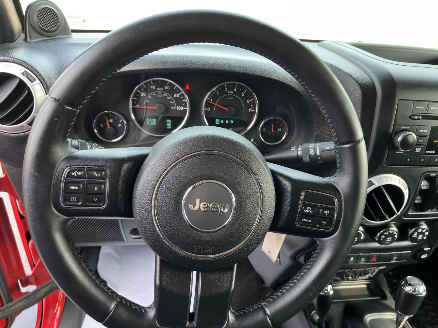 2014 Red /Black Jeep Wrangler Unlimited Sahara 4WD (1C4BJWEG7EL) with an 3.6L V6 DOHC 24V FFV engine, 5-Speed Automatic transmission, located at 547 E. Main St., Orwell, OH, 44076, (440) 437-5893, 41.535435, -80.847855 - 2014 Jeep Wrangler Unlimited Sahara 4WD – Flame Red with Trail Rated Capability and Classic Wrangler Style! This 2014 Jeep Wrangler Unlimited Sahara is a clean and capable 4-door ready for trails, daily driving, or weekend adventures. Powered by the reliable 3.6L Pentastar V6 engine paired with a- Photo#18
