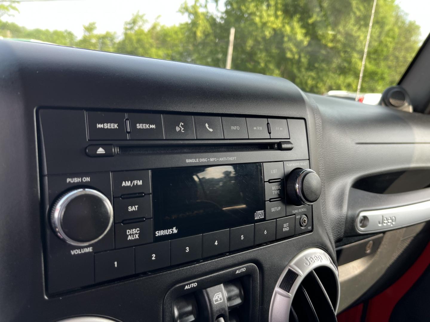 2014 Red /Black Jeep Wrangler Unlimited Sahara 4WD (1C4BJWEG7EL) with an 3.6L V6 DOHC 24V FFV engine, 5-Speed Automatic transmission, located at 547 E. Main St., Orwell, OH, 44076, (440) 437-5893, 41.535435, -80.847855 - 2014 Jeep Wrangler Unlimited Sahara 4WD – Flame Red with Trail Rated Capability and Classic Wrangler Style! This 2014 Jeep Wrangler Unlimited Sahara is a clean and capable 4-door ready for trails, daily driving, or weekend adventures. Powered by the reliable 3.6L Pentastar V6 engine paired with a- Photo#24